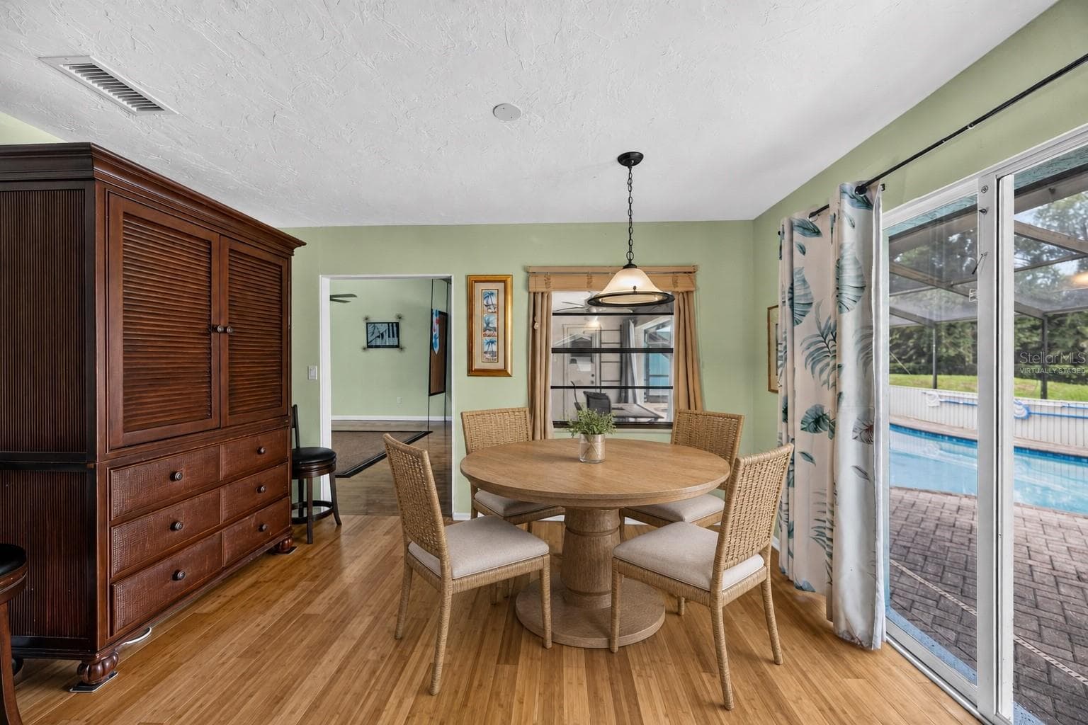 Virtually staged - Breakfast nook overlooking the pool area. - 1305 GREENFIELD CIR, VENICE