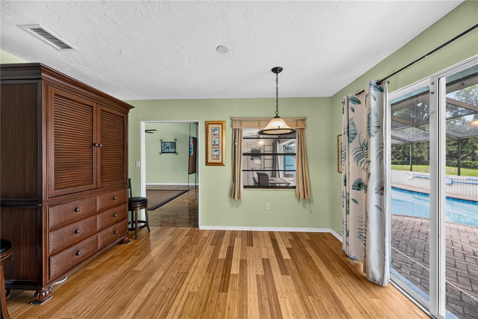 Breakfast nook overlooking the pool area. - 1305 GREENFIELD CIR, VENICE