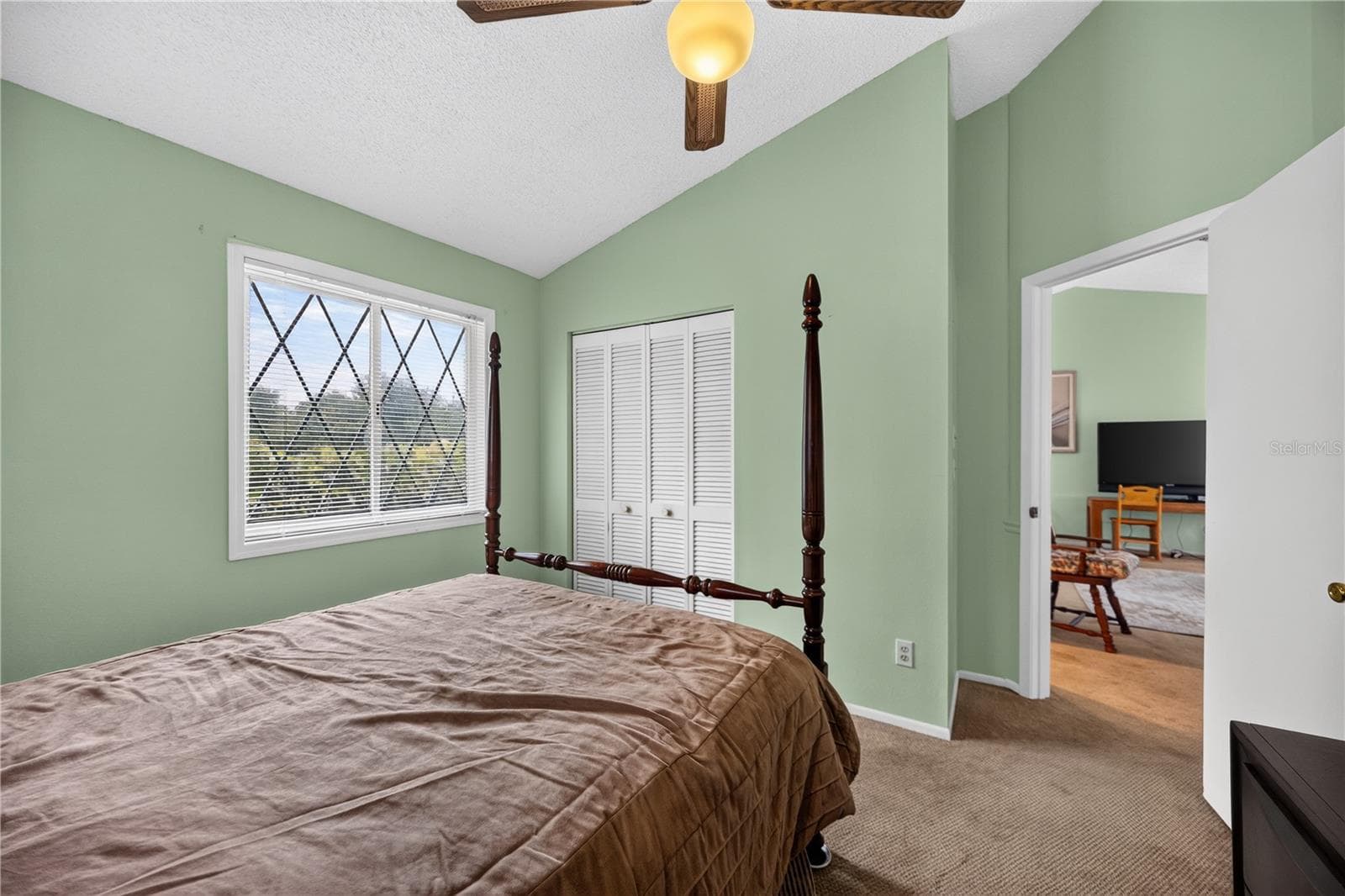 Second upstairs bedroom with closet access. - 1305 GREENFIELD CIR, VENICE