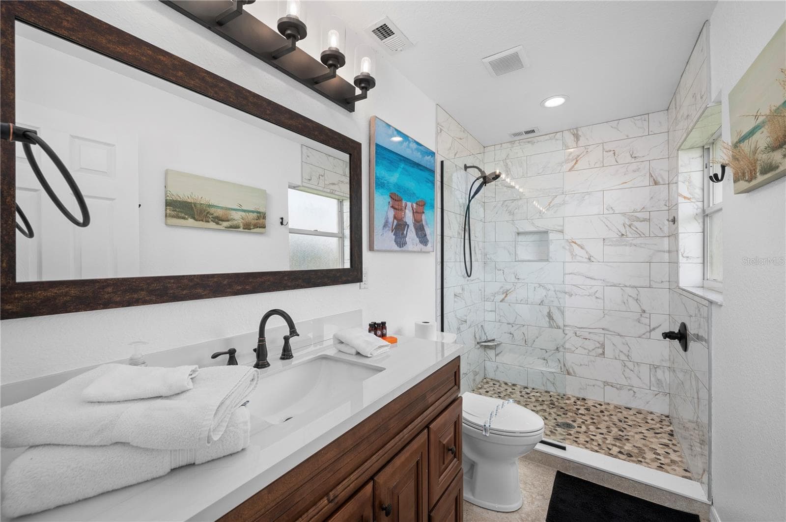 Private guest ensuite bath with shower - 265 BELVEDERE CT, PUNTA GORDA