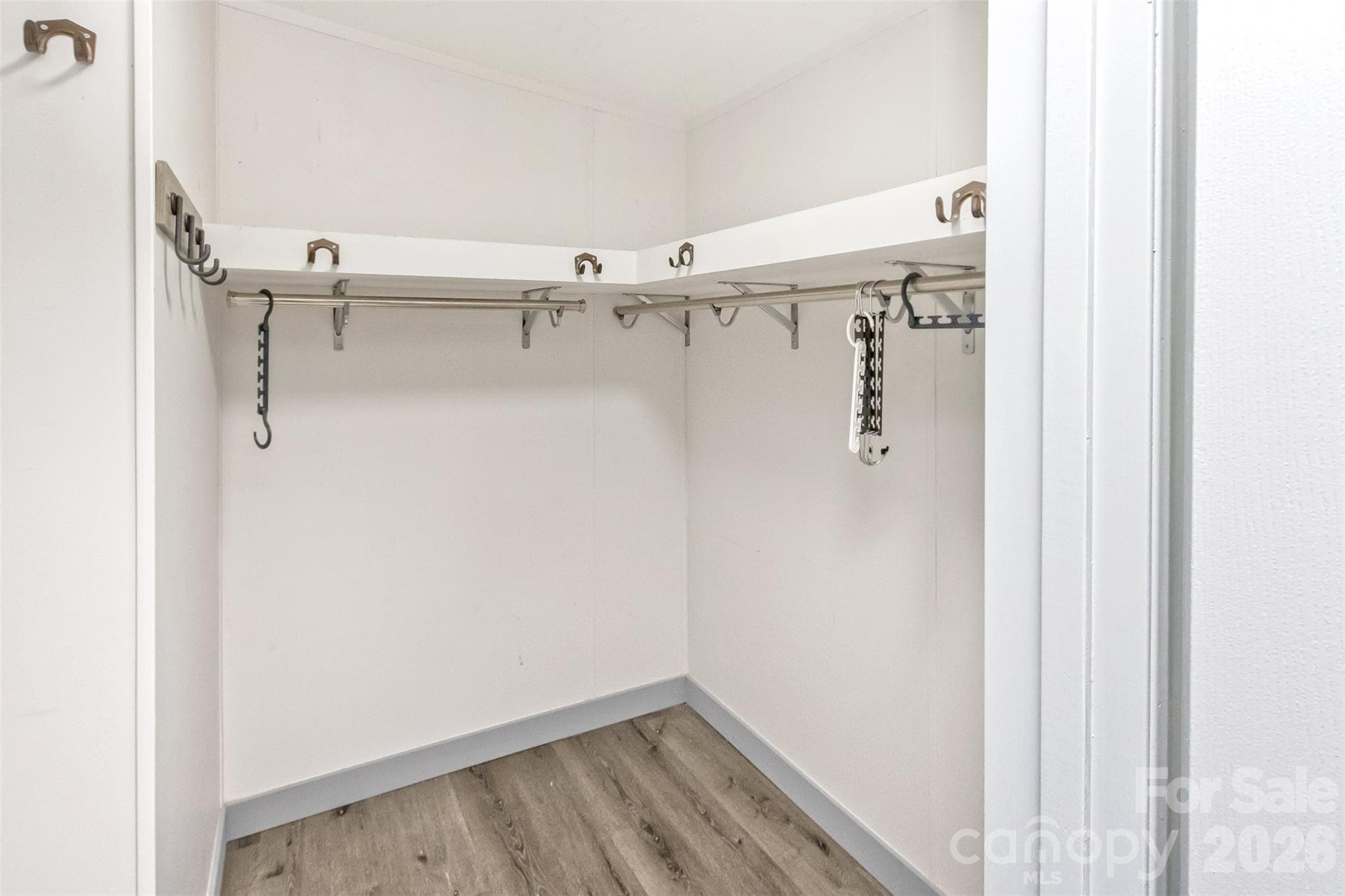 Walk-in closet in primary suite - 25 Asa Court, Black Mountain