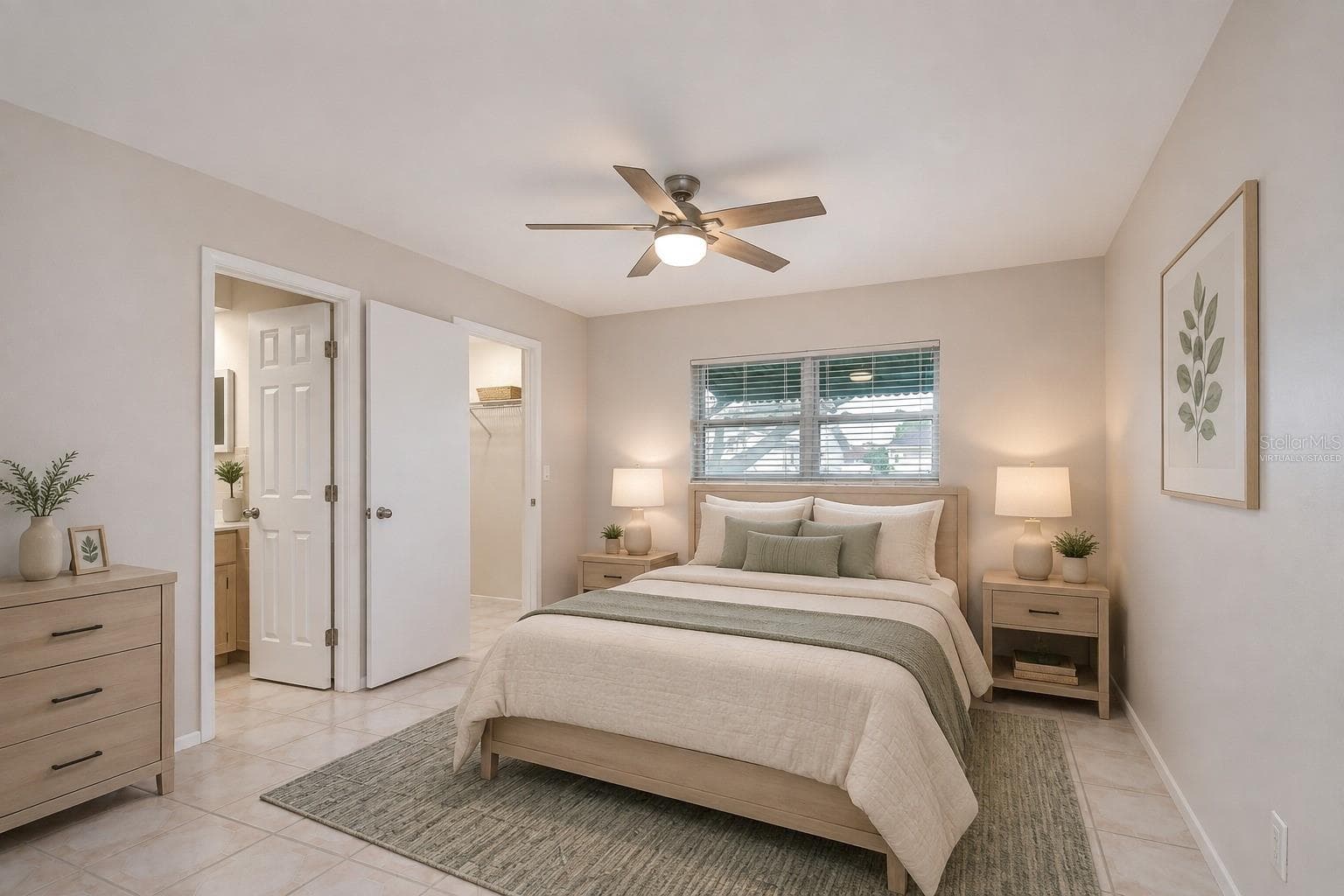 Primary bedroom with bathroom ensuite (virtually staged) - 8811 MARTINIQUE LN, PORT RICHEY