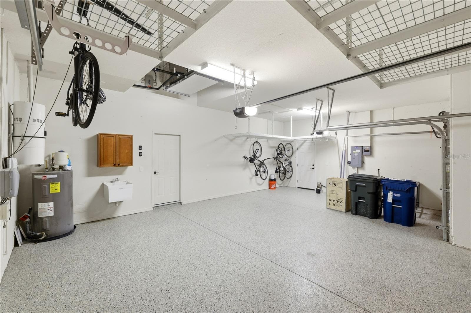 Garage with epoxy flooring - 309 S STONE BRIAR CREEK DR, VENICE