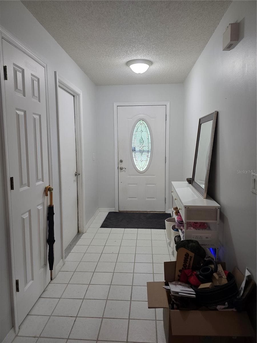 Front Entry - 1040 W VILLAGE GREEN RD, DELAND