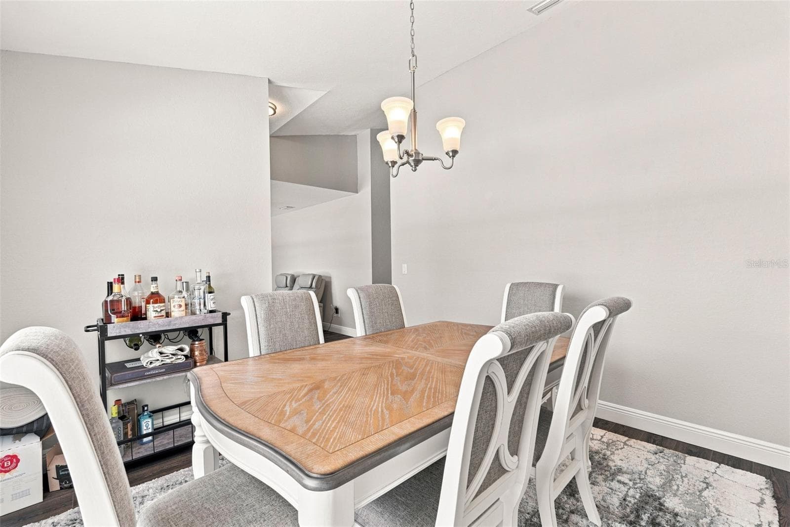 Dining Room with Designer Lighting - 3695 WAFFLE TER, NORTH PORT