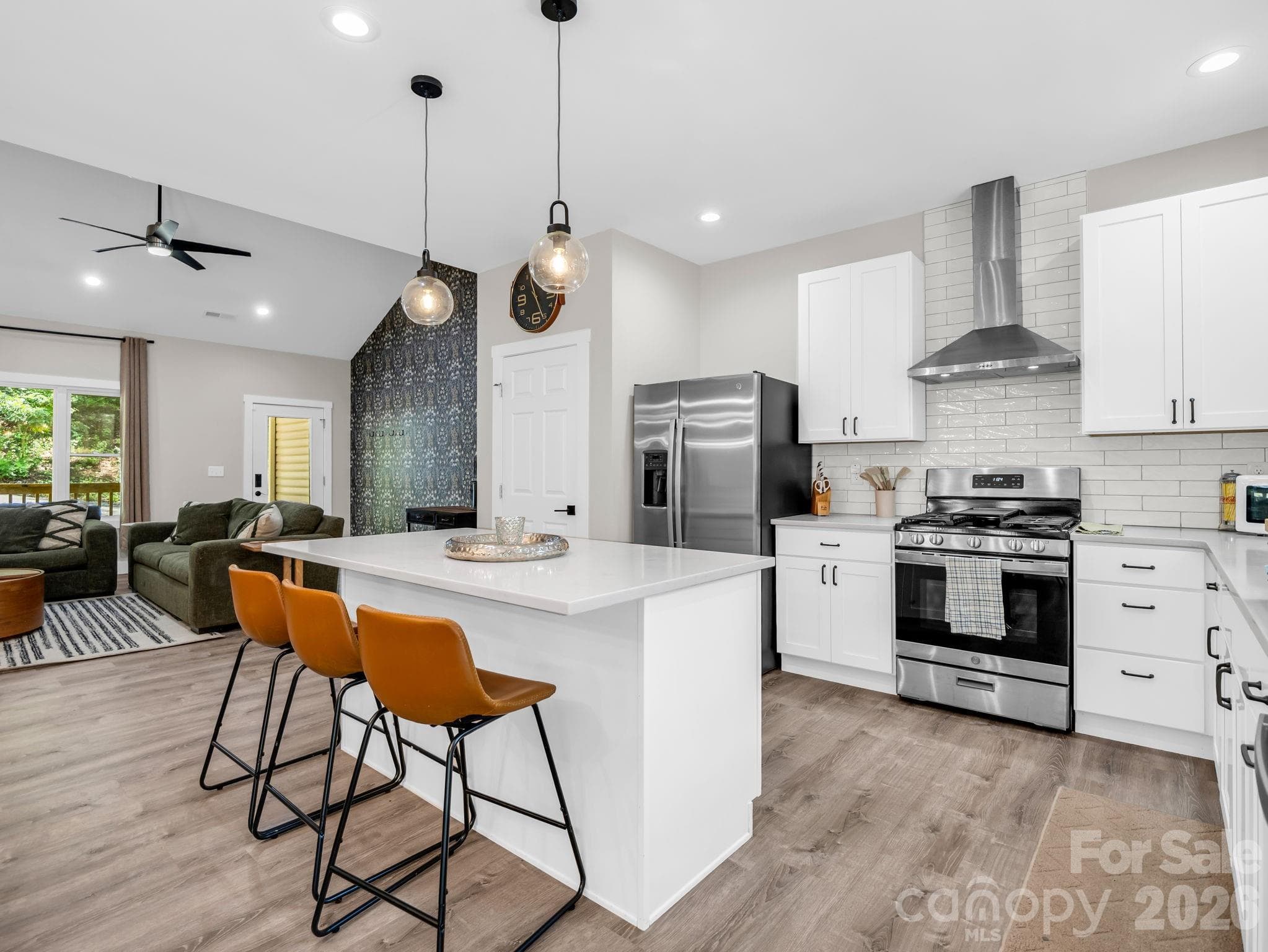Gas Stove with stainless steel exhaust hood. - 180 Ridgeview Drive, Hendersonville