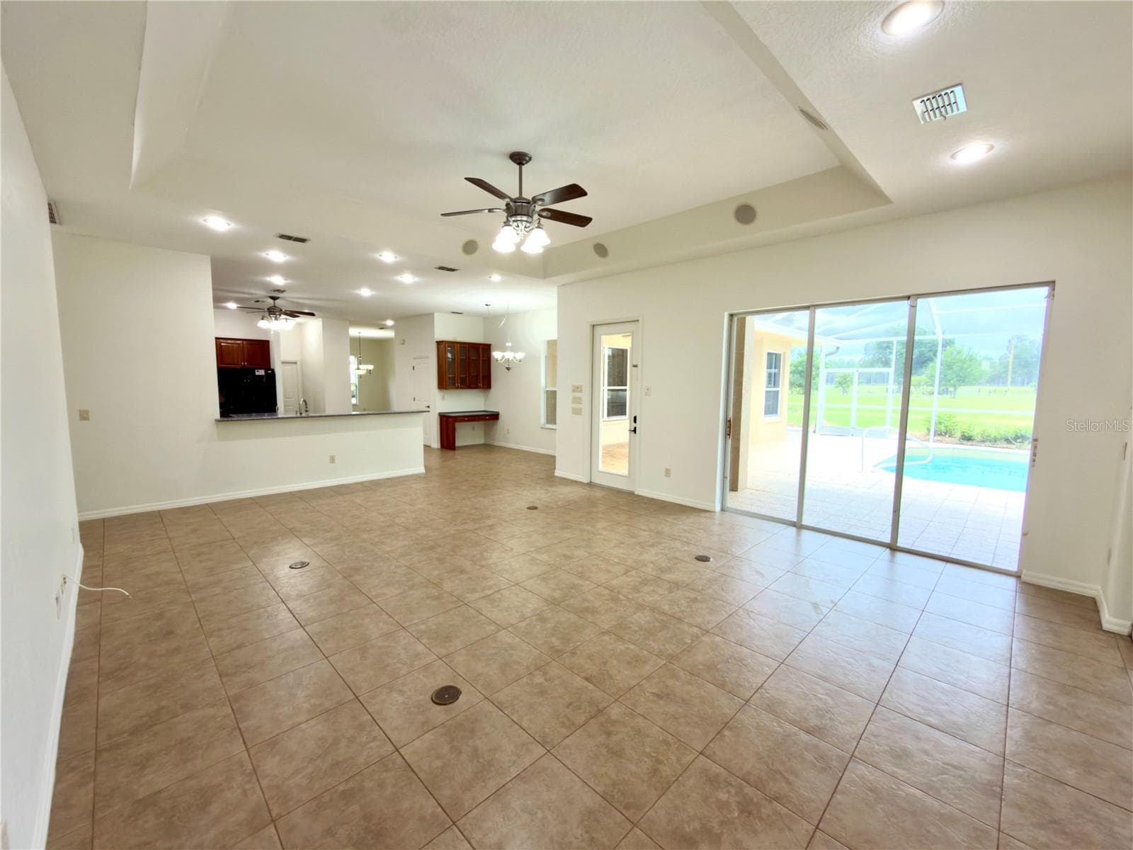 Great room looking toward kitchen - 24087 TWISTER LN, BROOKSVILLE