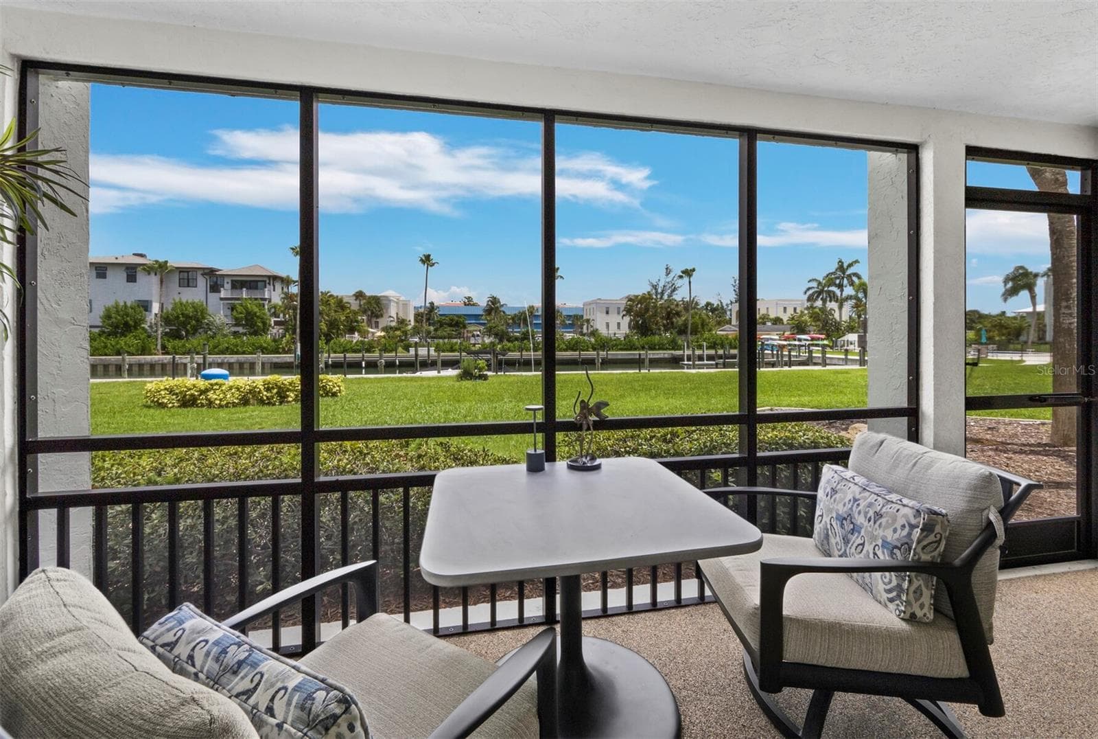 Lanai is enclosed for maximum enjoyment! - 448 GULF OF MEXICO DR #A104, LONGBOAT KEY