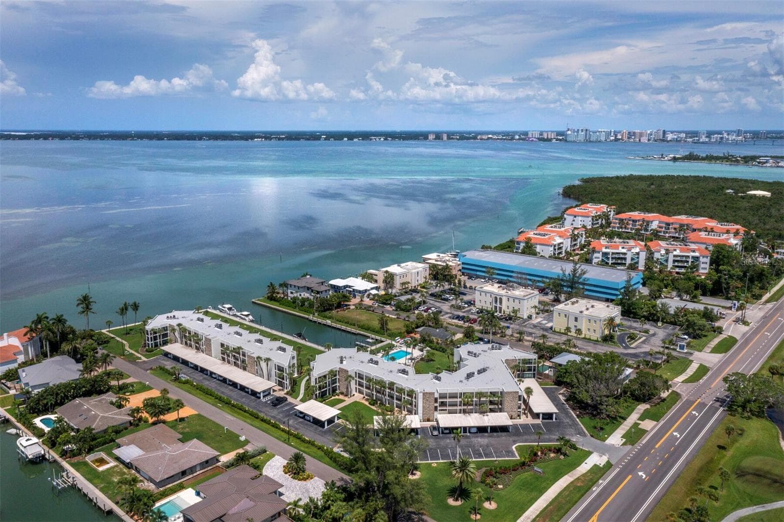Bay Harbour; two buildings with private marina; heated pool; covered parking and easy access to the lifestyle of the coast! - 448 GULF OF MEXICO DR #A104, LONGBOAT KEY