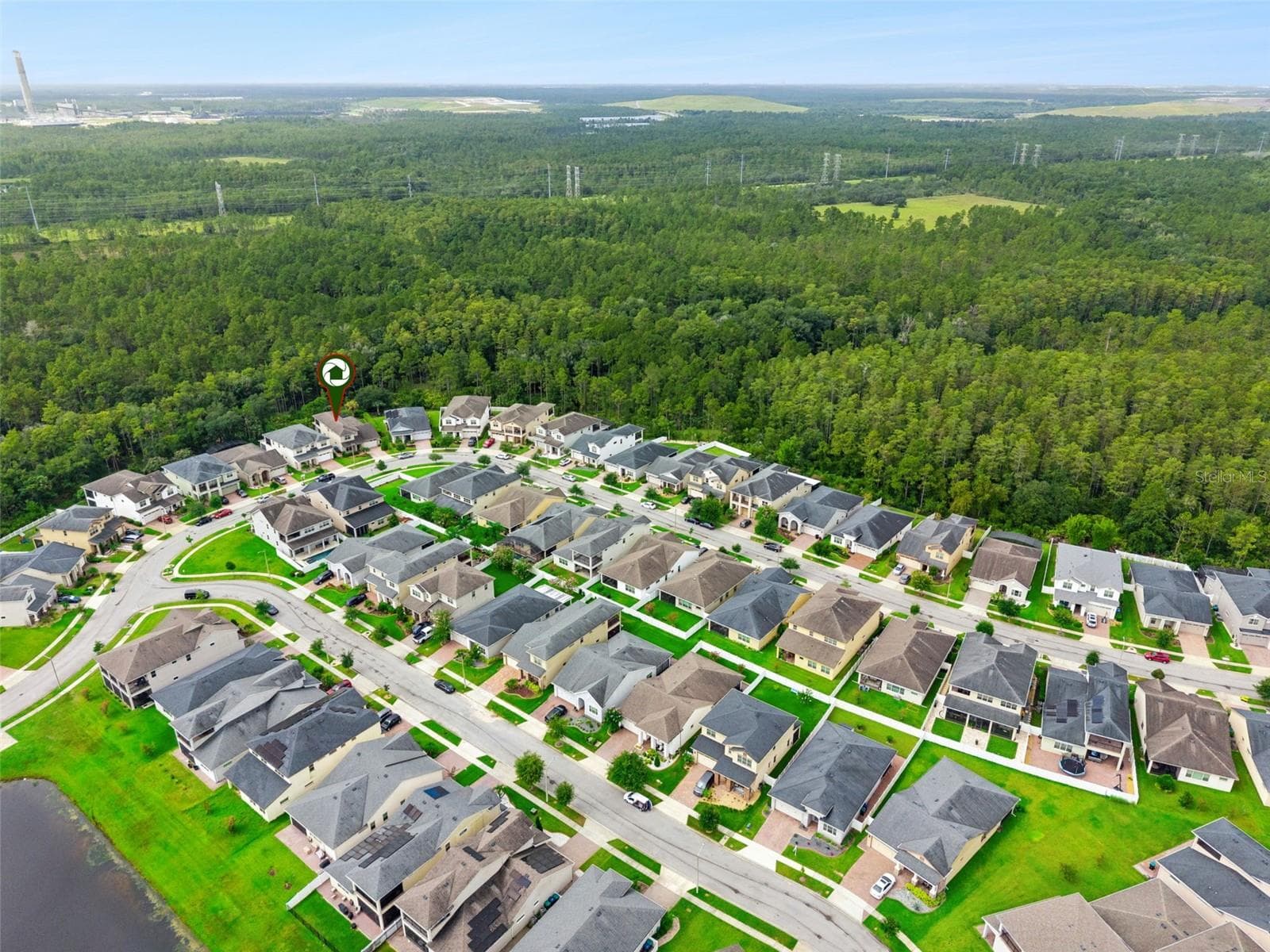 Aerial of the Neighborhood - Front of the home noted by the marker. - 14156 ALAFAYA OAK BND, ORLANDO