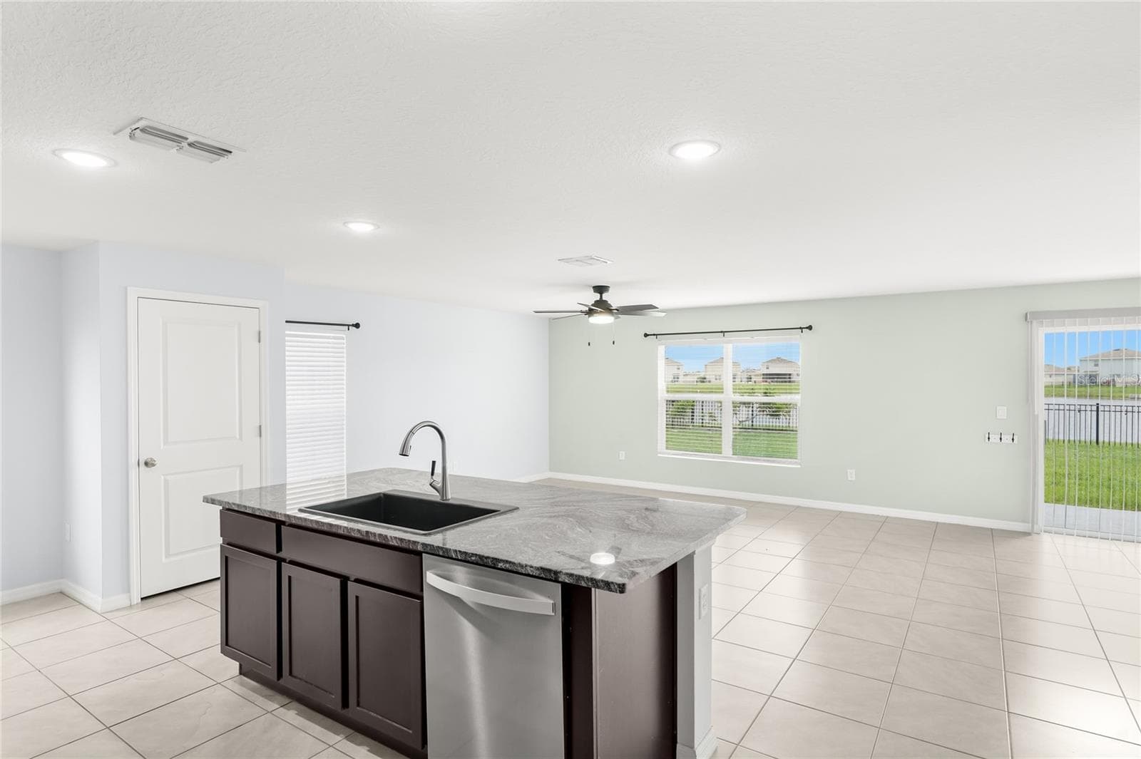 Kitchen to living room - 10116 CHARLOTTE DR, PARRISH