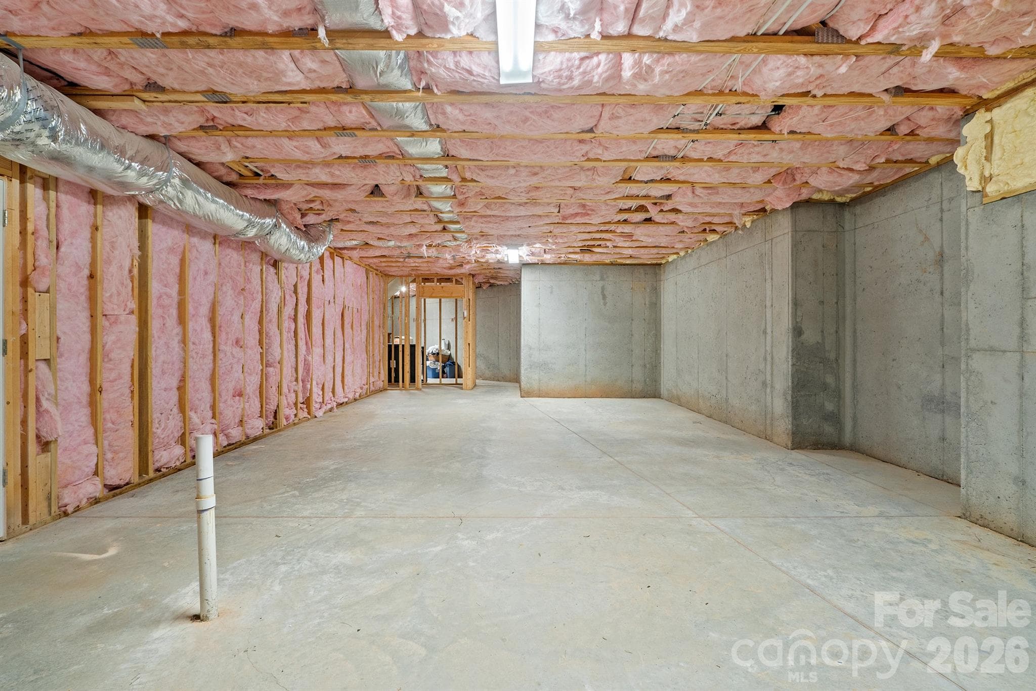 Unfinished basement area already plumbed for an extra bathroom - 121 Cheyenne Lane, Statesville