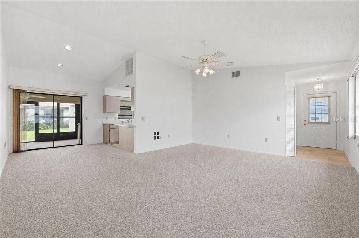 Living Room to Dining Area - 3741 INNISBROOK DR, LAKELAND