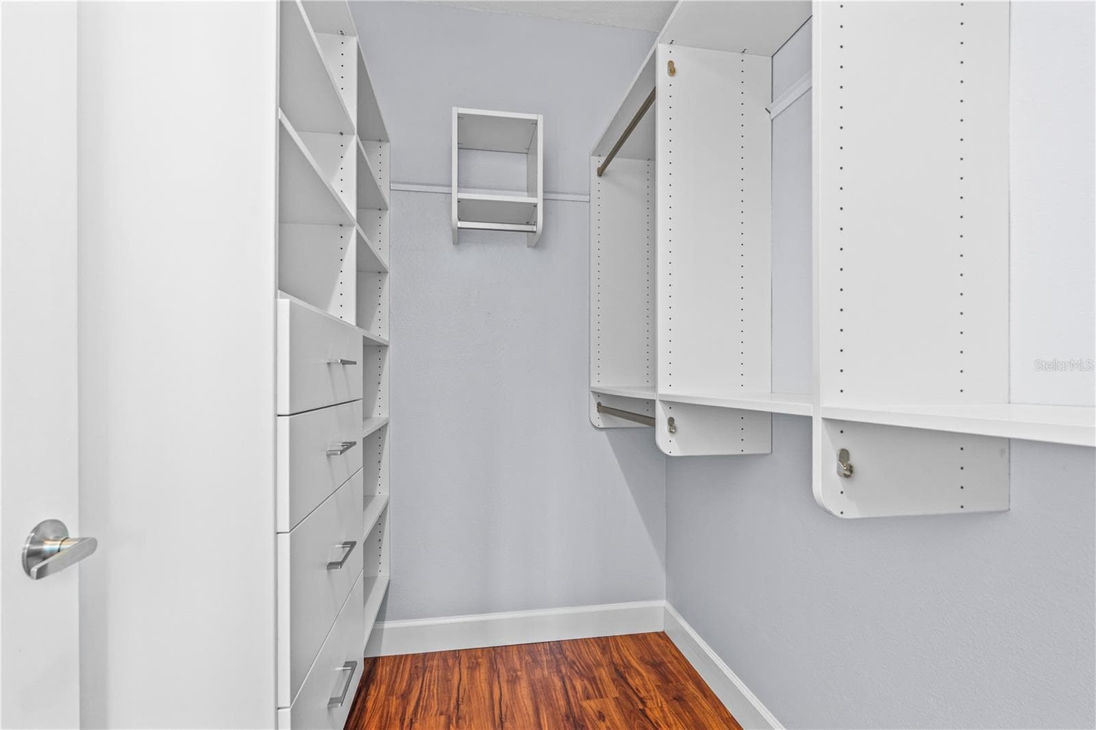 walk in closet for the primary, built in features - 762 PINE SHORES CIR, NEW SMYRNA BEACH
