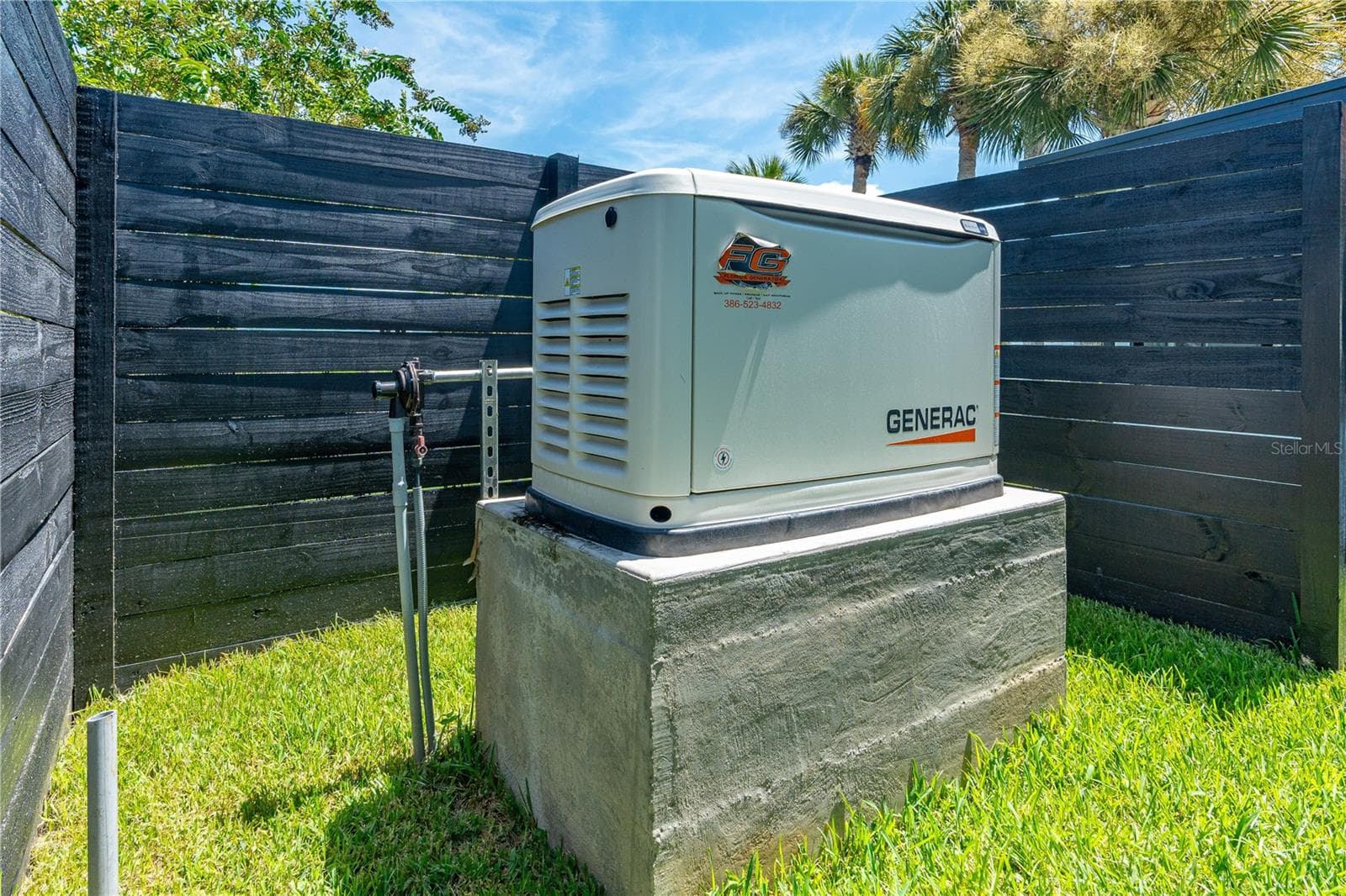 Home Generator with under ground propane tank - GENERAC - 762 PINE SHORES CIR, NEW SMYRNA BEACH