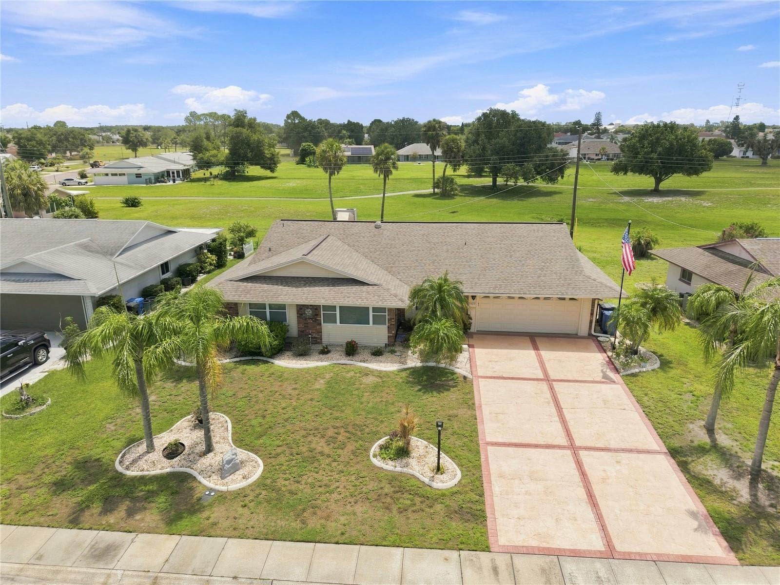 Low Aerial Front & Rear Open Green Space, Re-Roofed 2022 - 1405 HACIENDA DR, SUN CITY CENTER