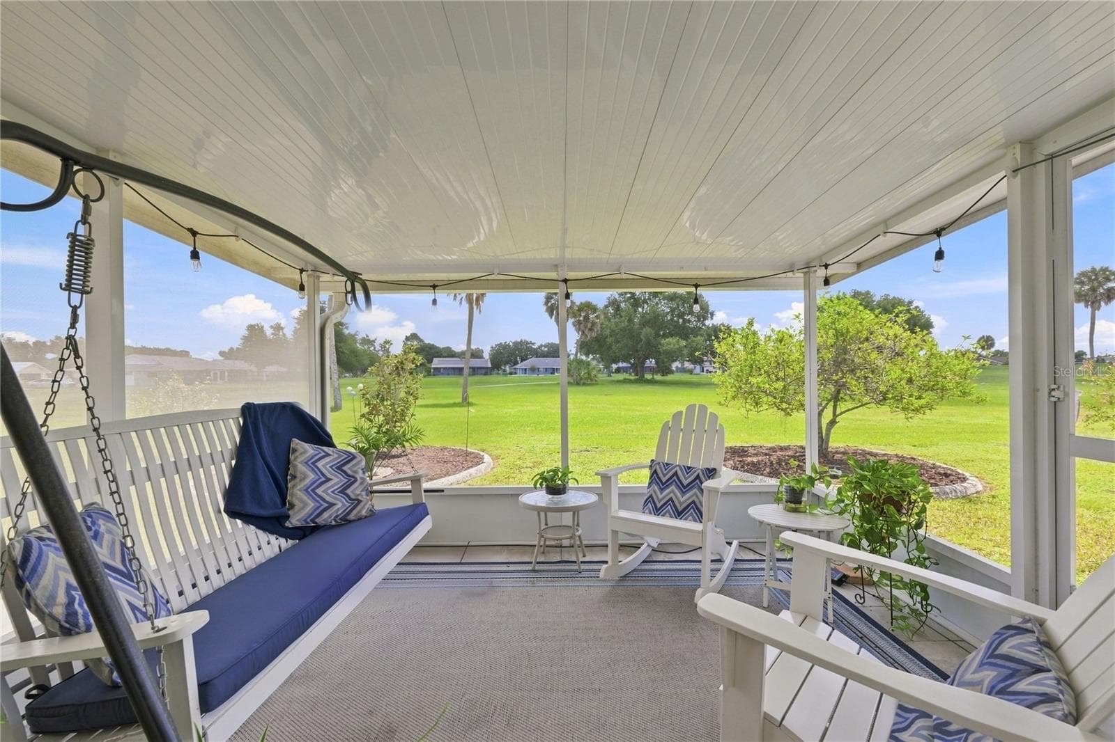 Covered, Screen Lanai, Lovey Open Green Space View - 1405 HACIENDA DR, SUN CITY CENTER