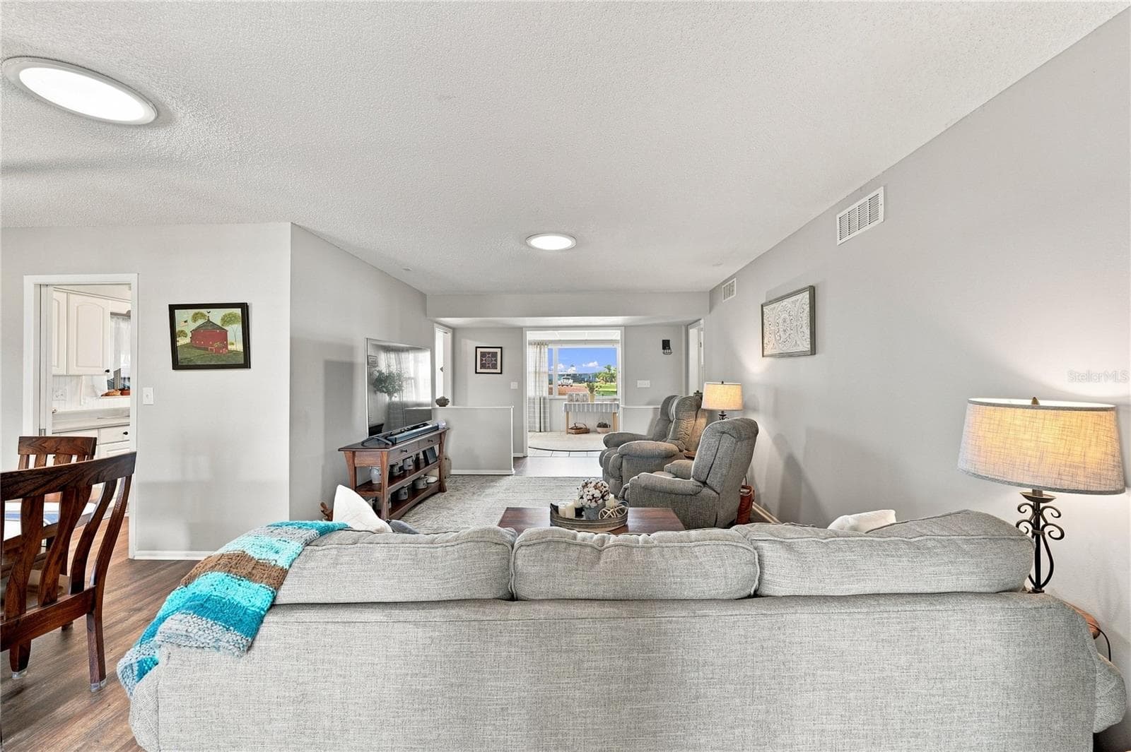 Living/Dining Combo, Large Entry Picture Window, Freshly Painted Interior - 1405 HACIENDA DR, SUN CITY CENTER