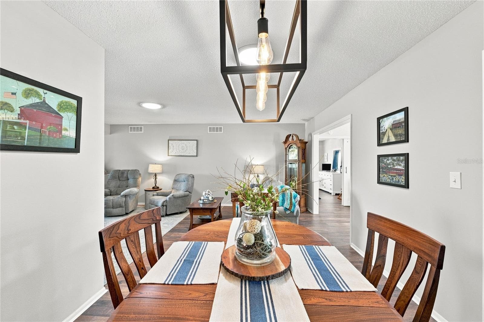 Inviting Dining/Living Combo, New Modern Fixtures & Fans & Solar Tubes - 1405 HACIENDA DR, SUN CITY CENTER