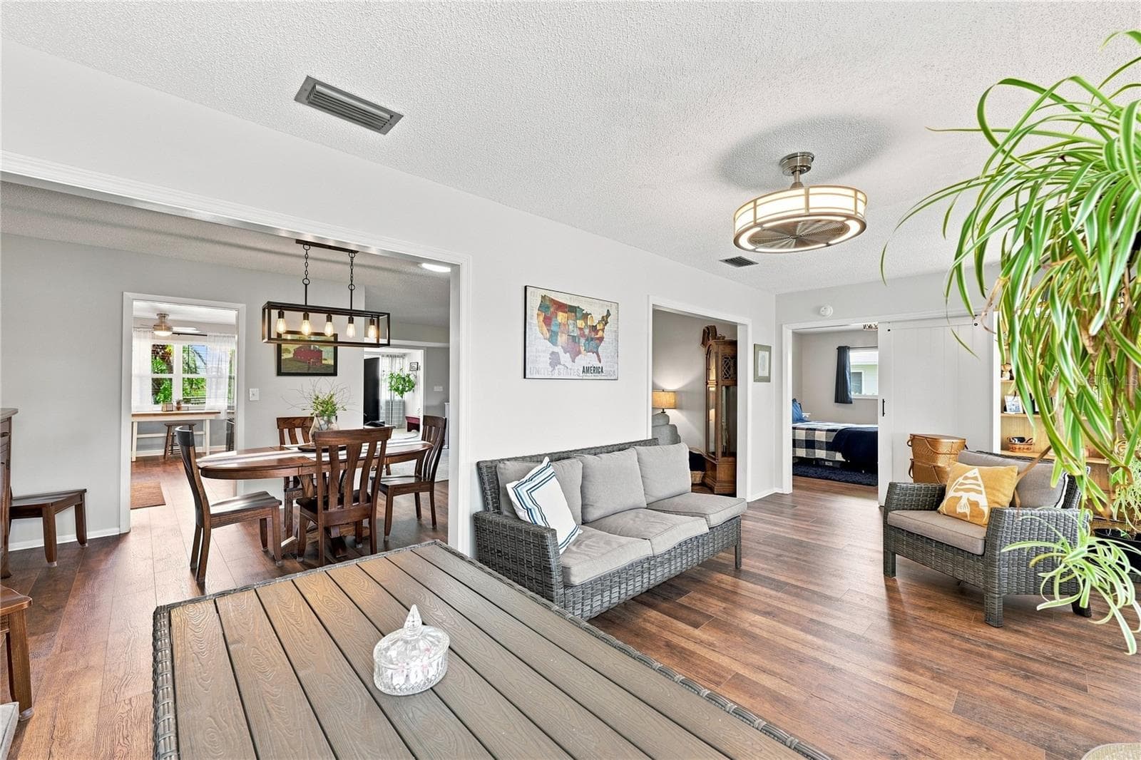 Updated Fans & Fixtures, Modern Fans & Fixtures & Hardware, Primary Suite Privacy-Sliding Barn Door, Beautiful Laminate Oak Plank Flooring - 1405 HACIENDA DR, SUN CITY CENTER