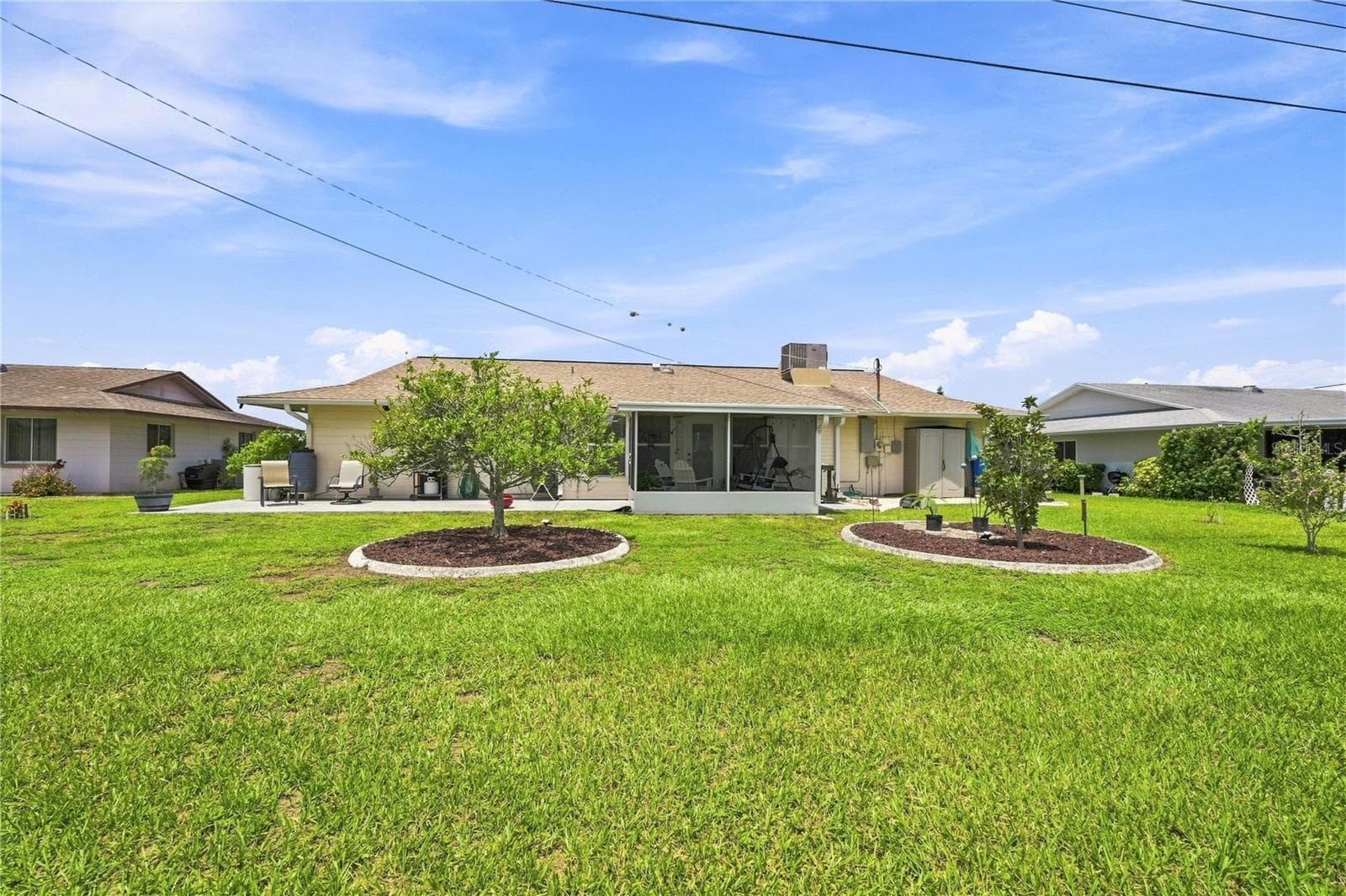 Well Kept Home Inside & Out, Lovely Rear Yard - 1405 HACIENDA DR, SUN CITY CENTER