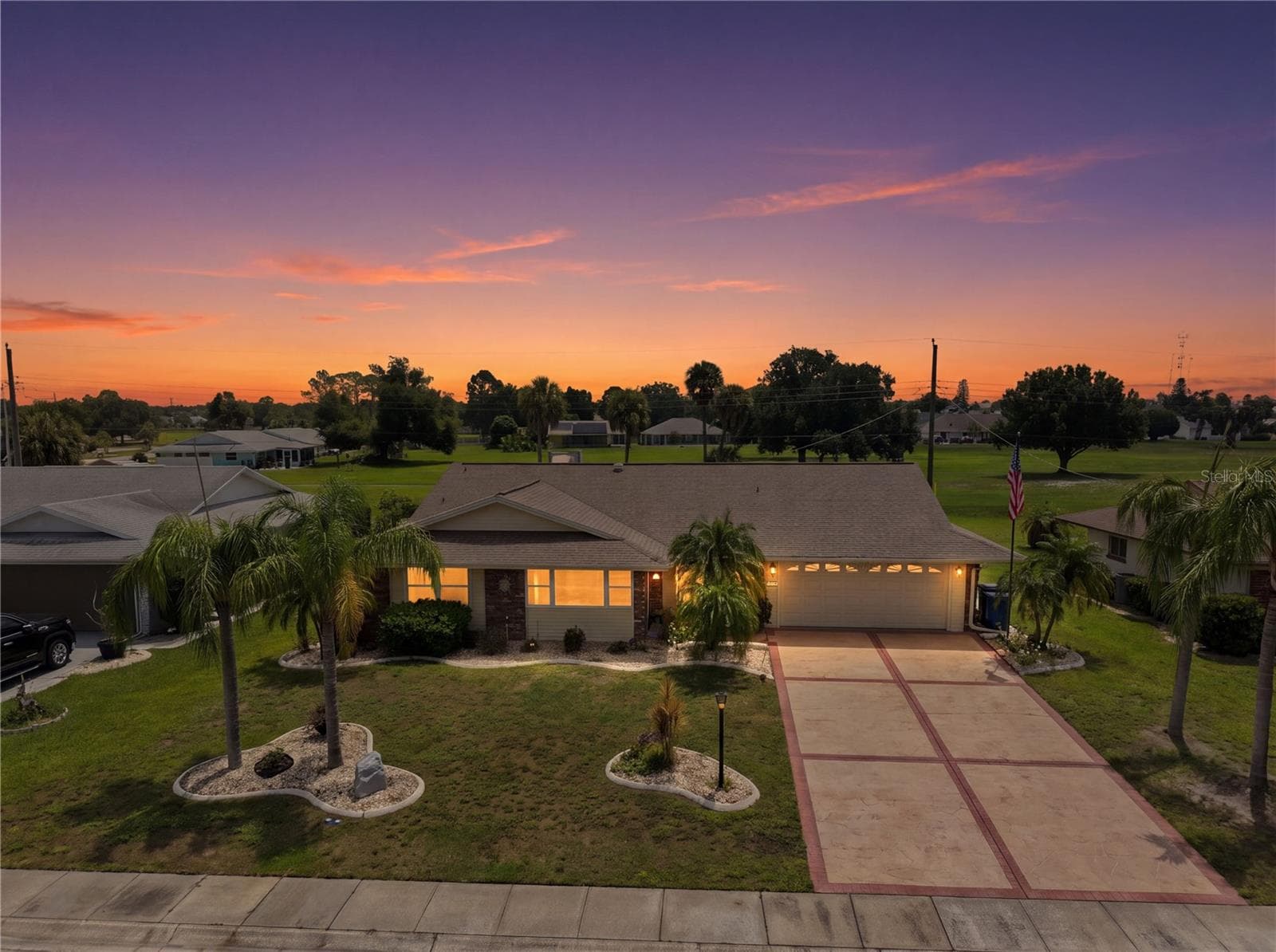 Twilight Front, Exceptional Curb Appeal - 1405 HACIENDA DR, SUN CITY CENTER
