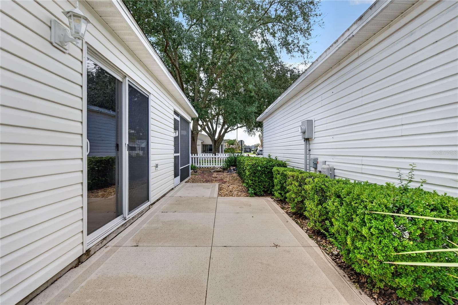 Side Patio - 16970 SE 94TH SUNNYBROOK CIR, THE VILLAGES