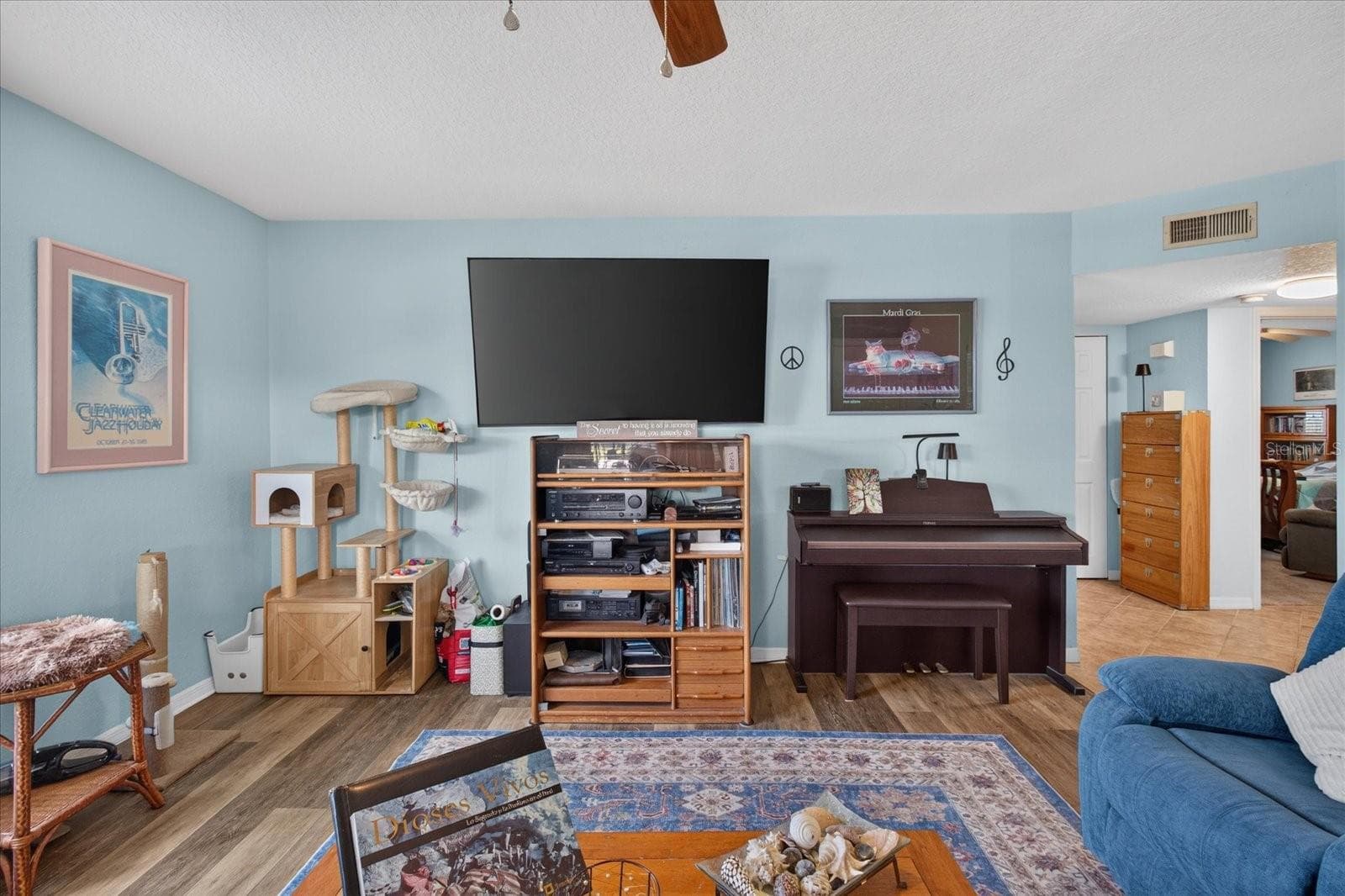 Living Room With Luxury Vinyl Plank and Impact Windows Installed in 2025 - 6100 GULFPORT BLVD S #401, GULFPORT