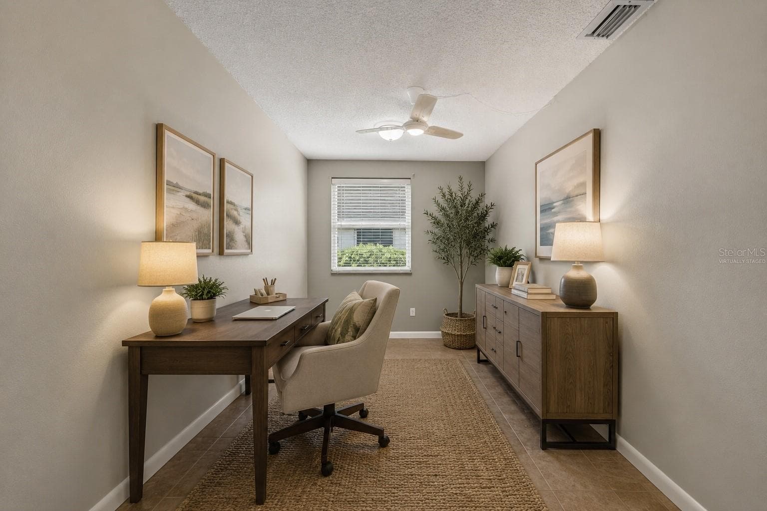 Virtually Staged Utility Room Transformed Into a Den - 1226 PINE NEEDLE RD, VENICE