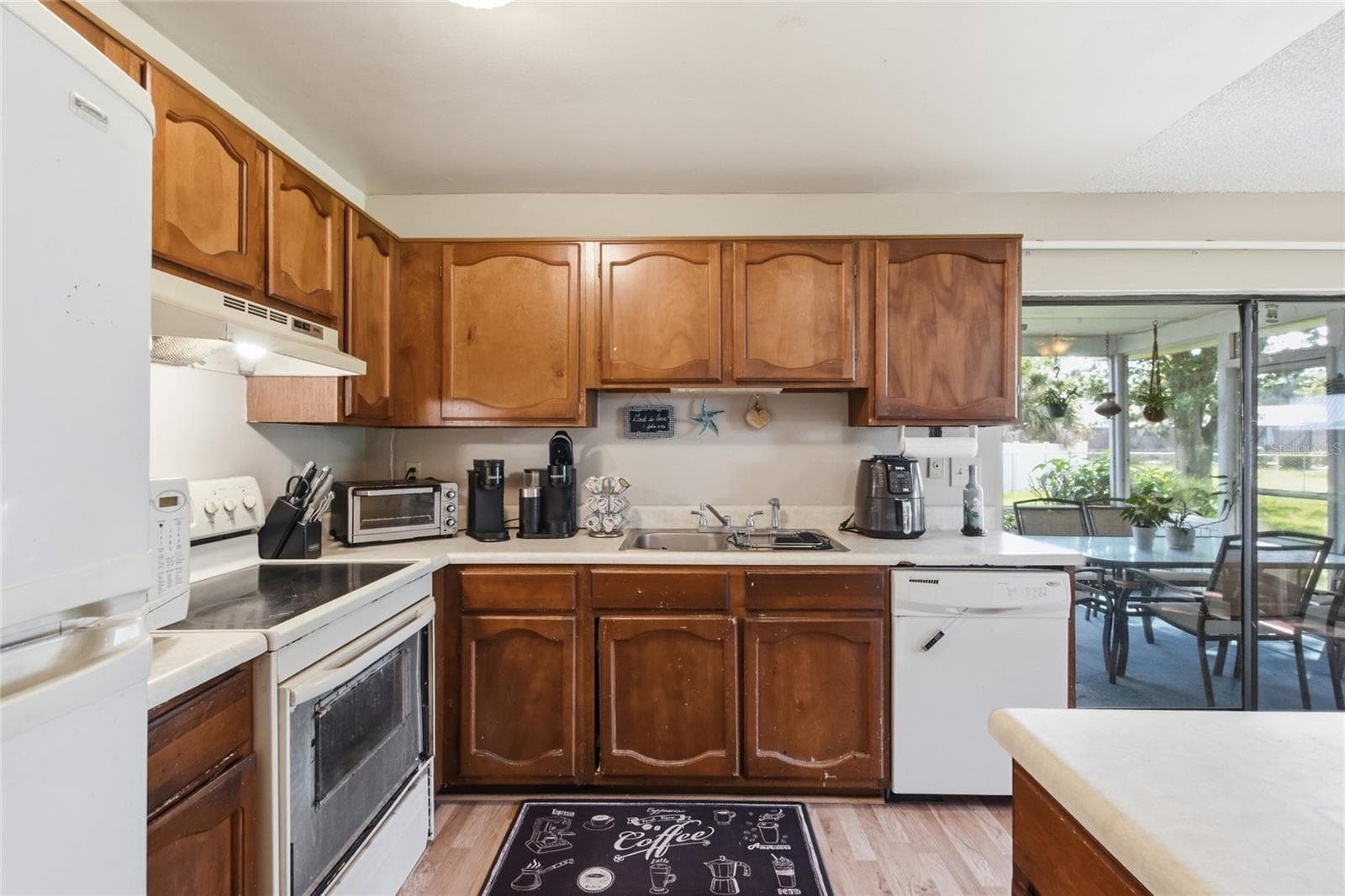 Kitchen View from Great Room - 3028 WOOD SONG CT, MULBERRY