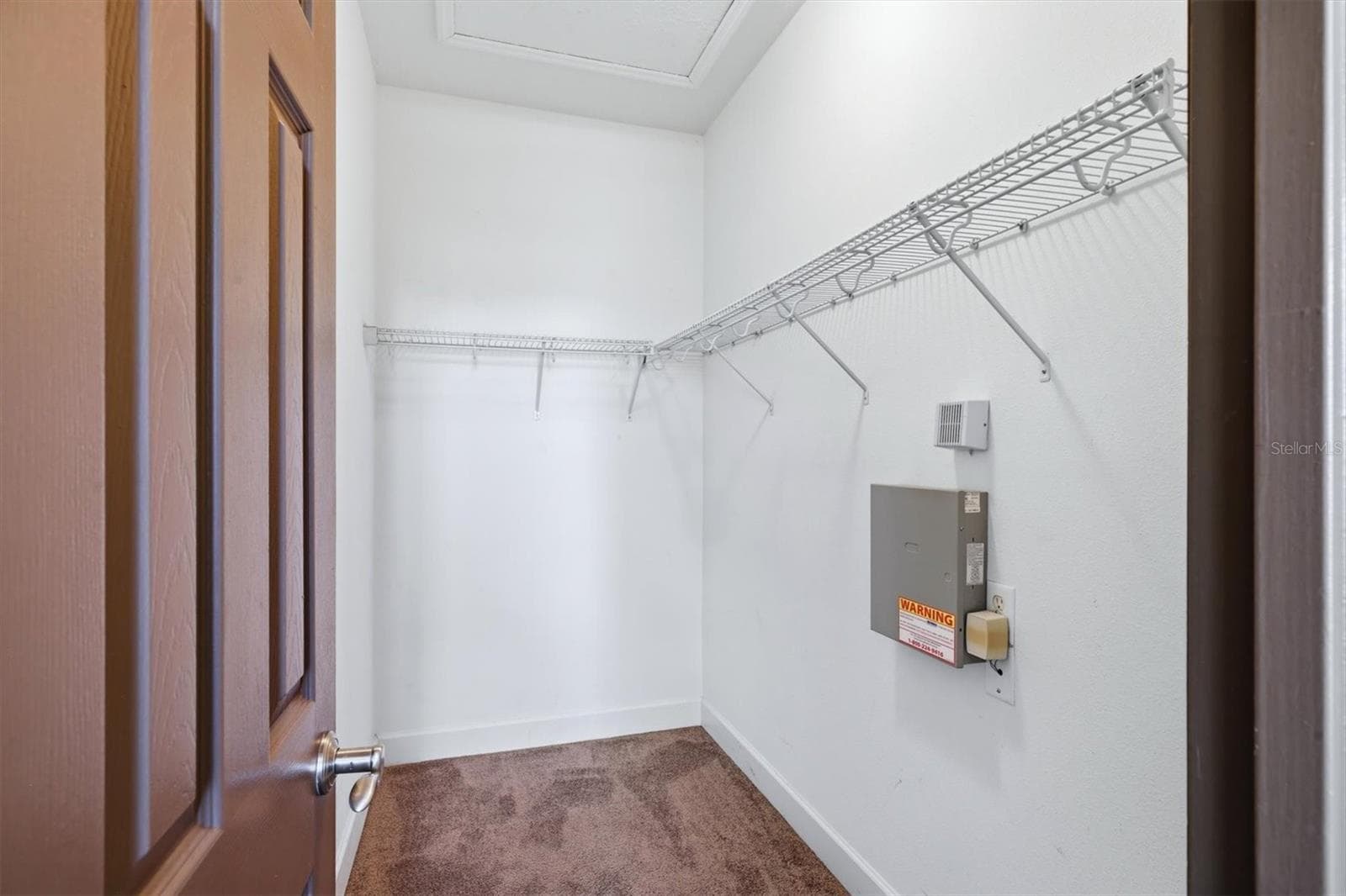 Primary walk in closet - 8098 MOONSTONE DR #17-203, SARASOTA