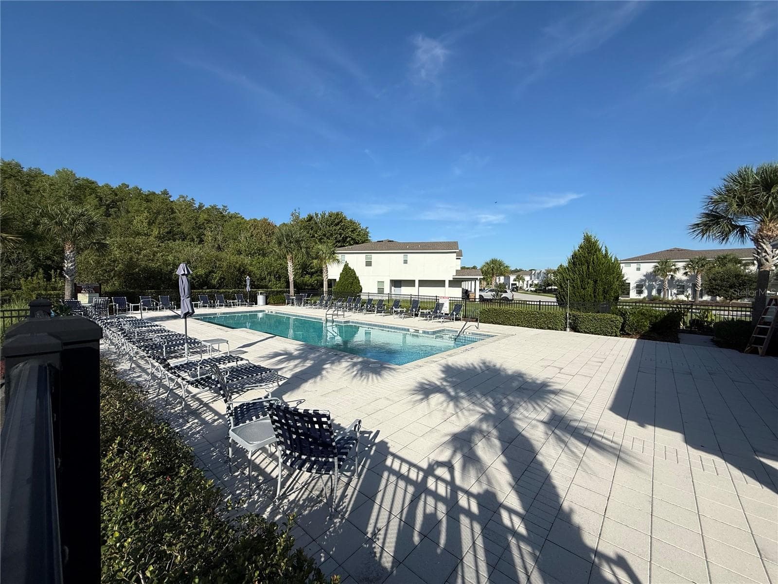 Community pool. - 3363 BELLEZZA CT, KISSIMMEE
