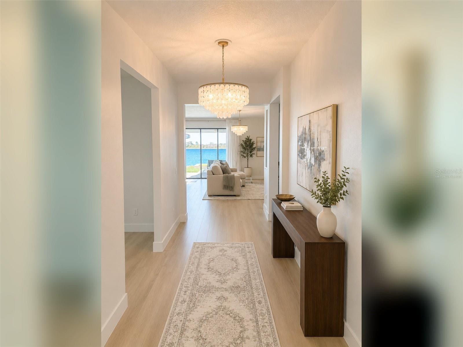 14048 Larkspur Lake Dr -Welcoming entry hallway leading into the open-concept living areas. Virtually staged. - 14048 LARKSPUR LAKE DR, WINTER GARDEN