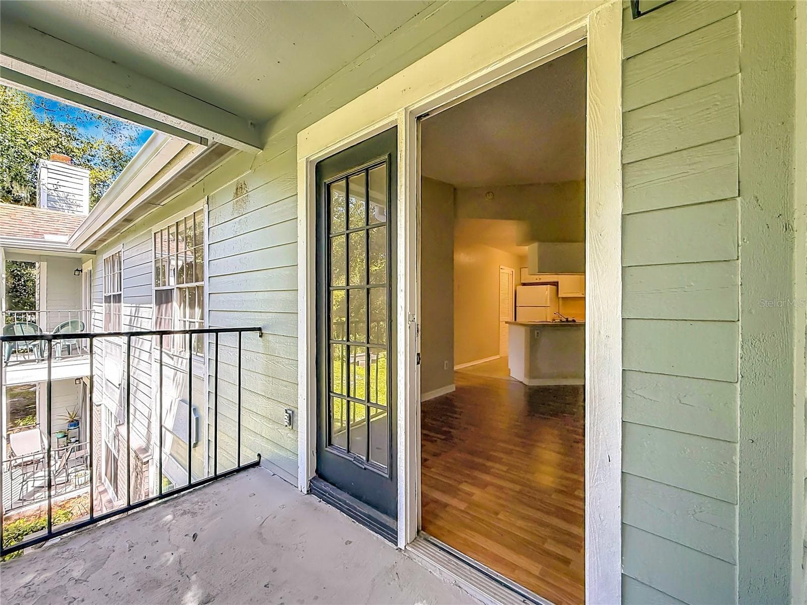 Back Patio with Water views - 2550 N ALAFAYA TRL #12205, ORLANDO