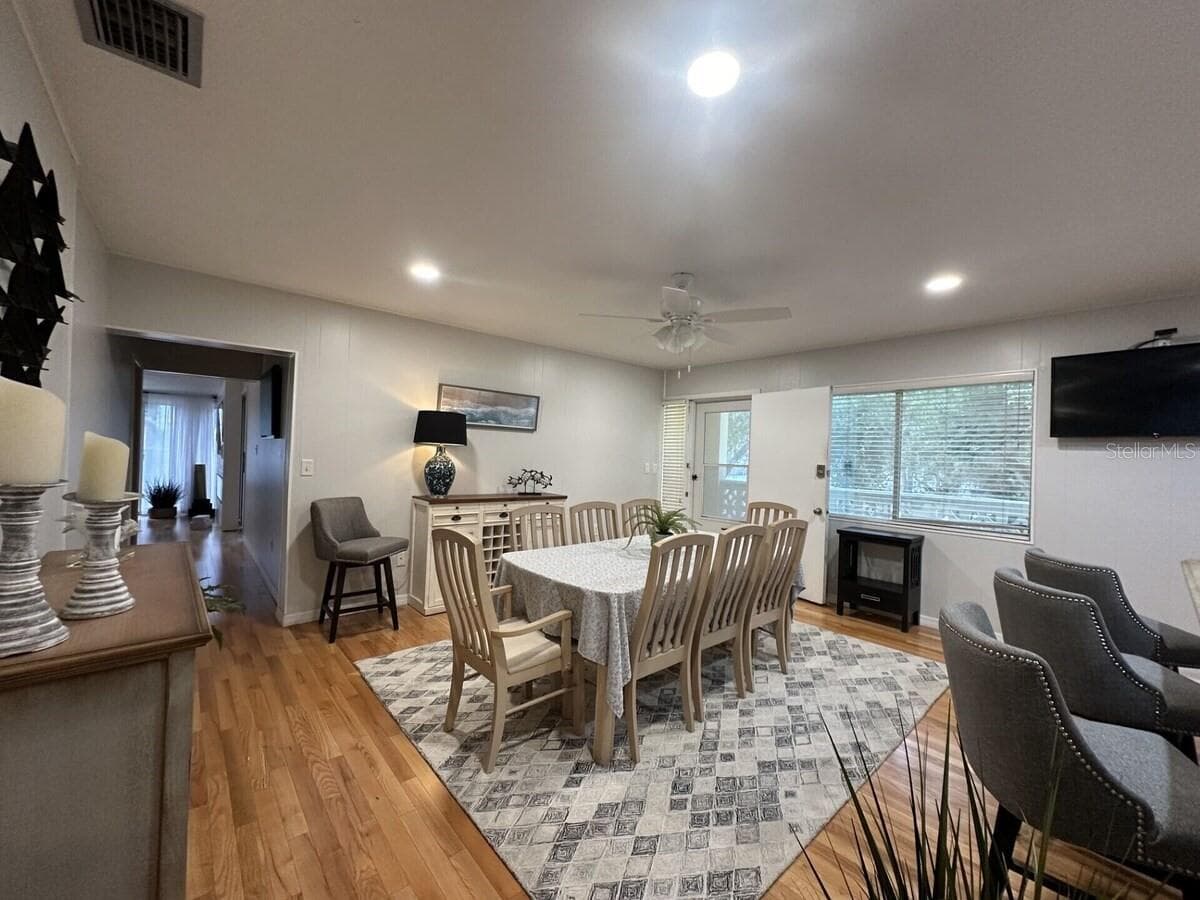 Dining area in kitchen area. - 5955 MIDNIGHT PASS RD #21E, SARASOTA