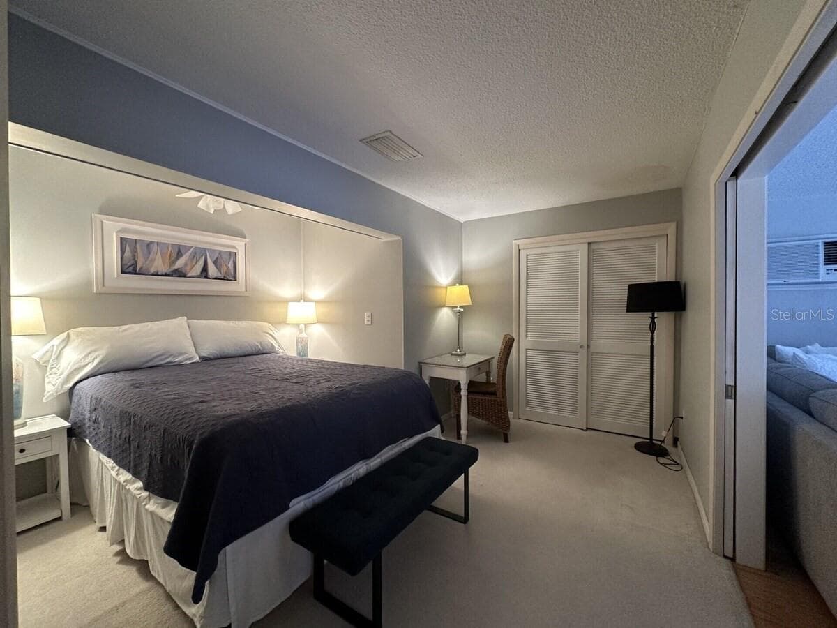 Main Bedroom #1 with king bed. - 5955 MIDNIGHT PASS RD #21E, SARASOTA
