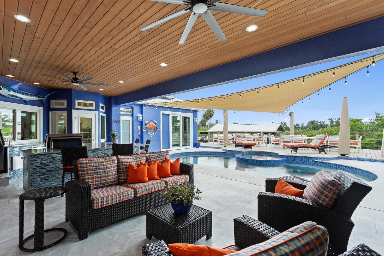 Large covered Patio for effortless entertaining - 704 EAGLE LN, APOLLO BEACH