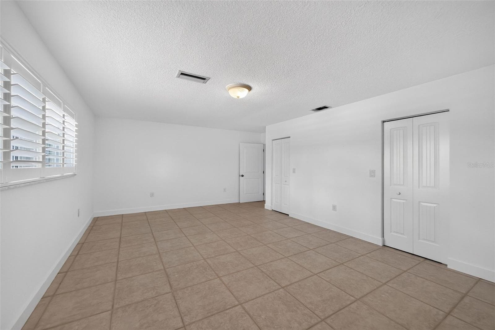 Primary bedroom has two walk in closets - 200 S OXFORD DR, ENGLEWOOD