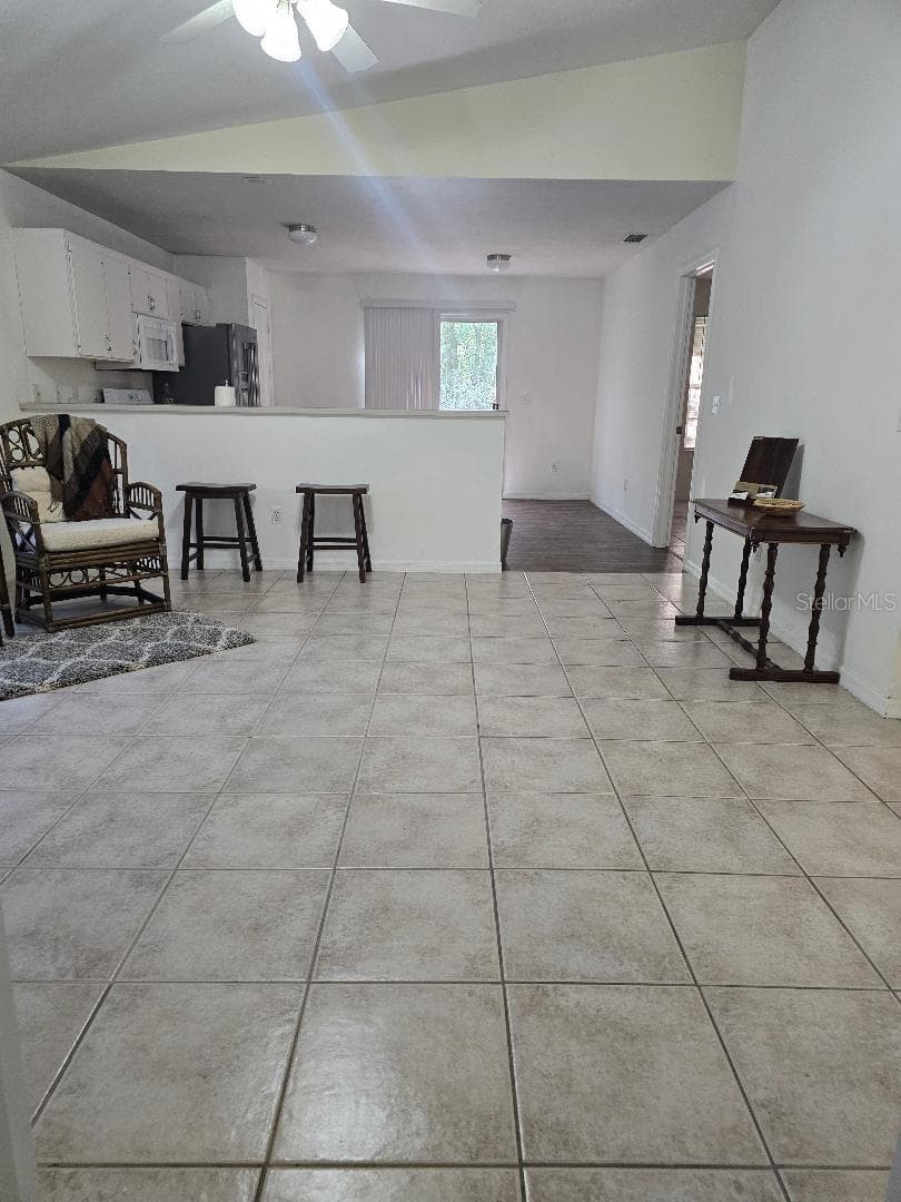 Living room to kitchen - 13607 NW 135 DR, ALACHUA