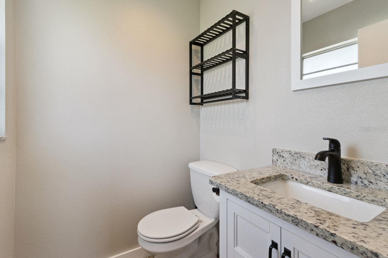 Half bath in Primary bedroom - 220 ALDO DR, BABSON PARK