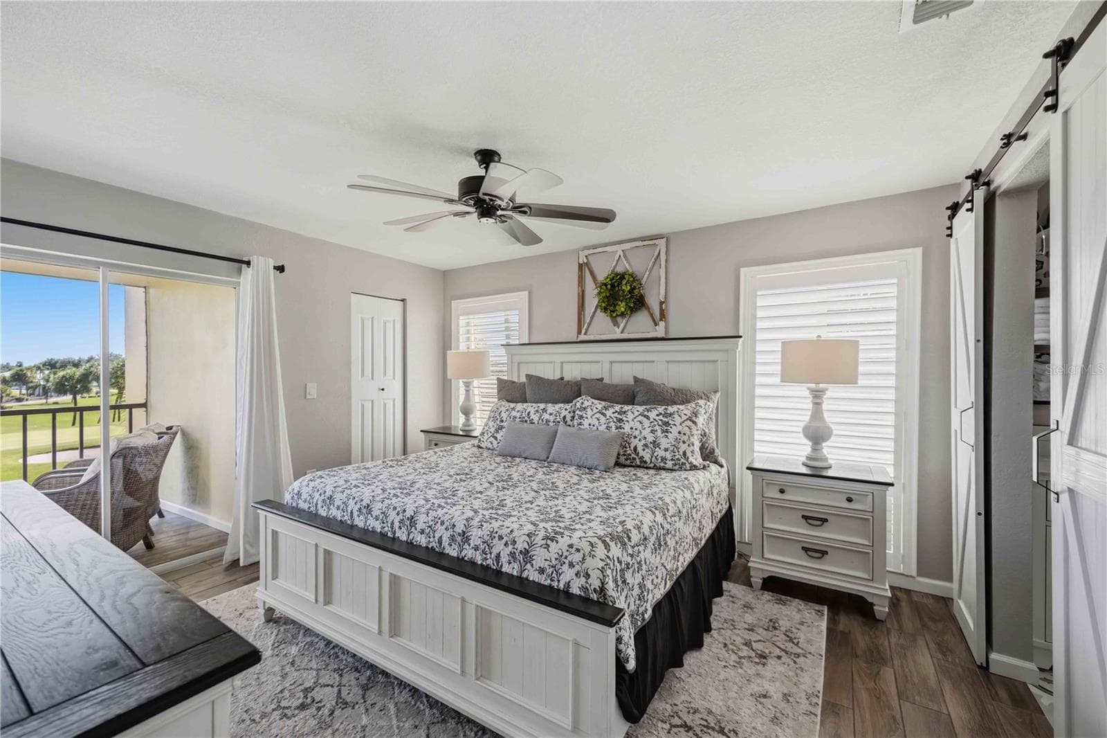 Primary suite offers generous proportions, dual exposures and an inviting connection to the lanai. - 406 CERROMAR CIR N #328, VENICE