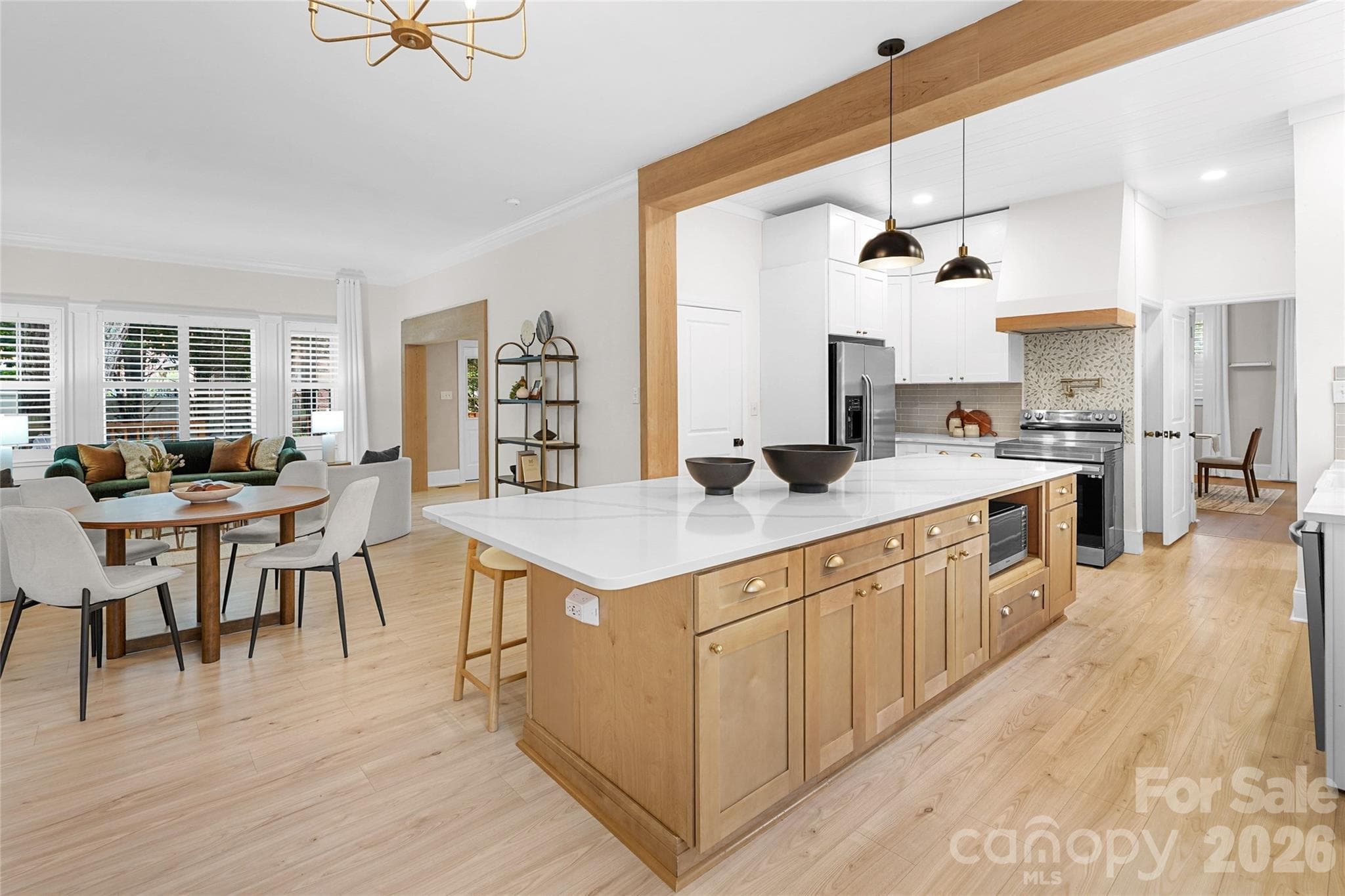 Designed for gathering, with an easy connection between the kitchen and main living spaces. - Charlotte