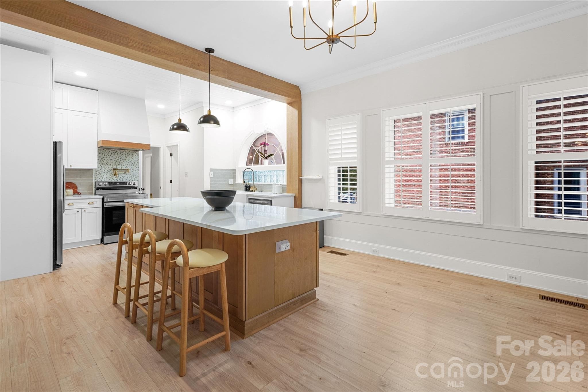 Fully reimagined kitchen with new cabinetry, quartz countertops, and stainless steel appliances - Charlotte
