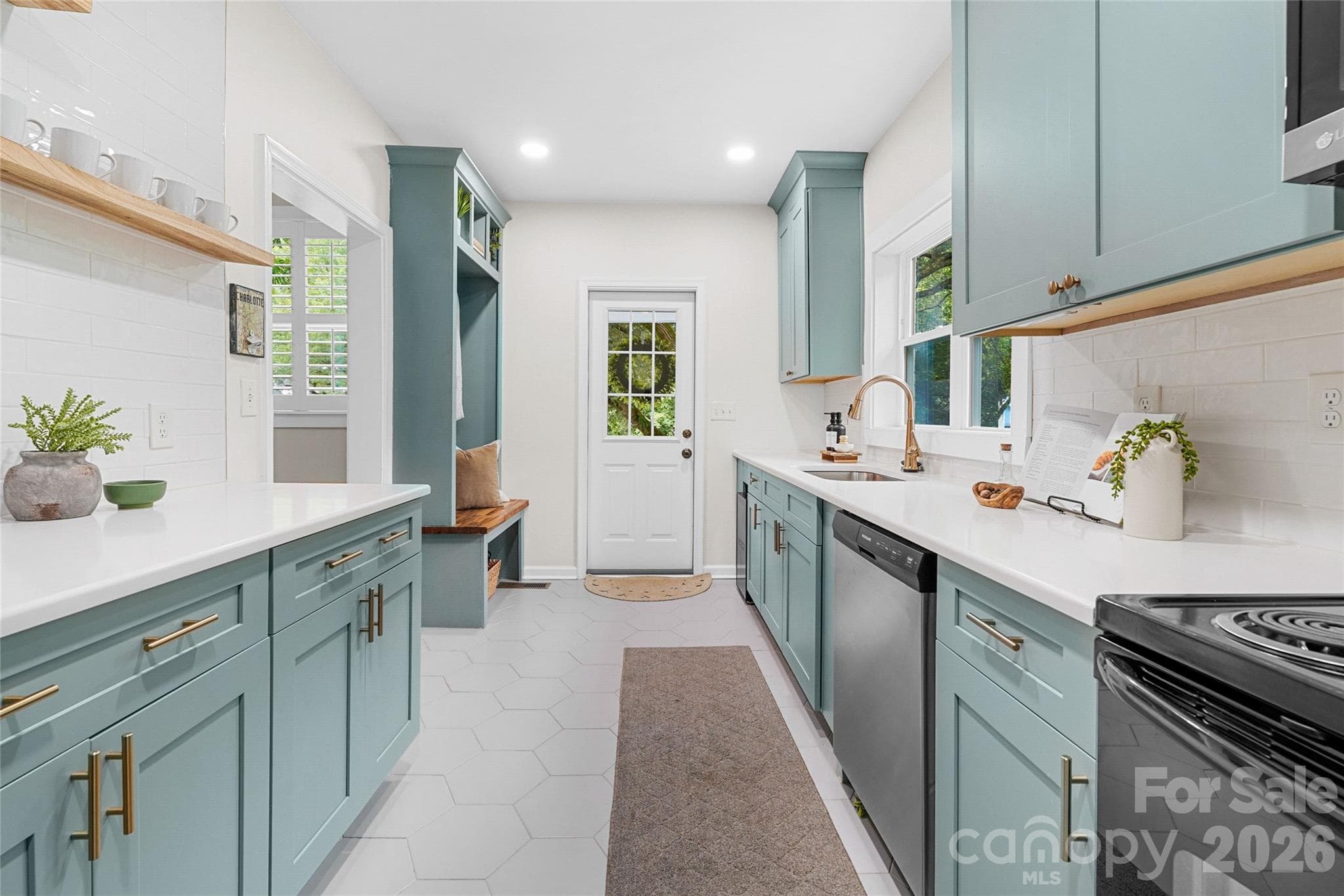A remodeled kitchenette and separate entrance add even more possibilities to this flexible wing. - Charlotte