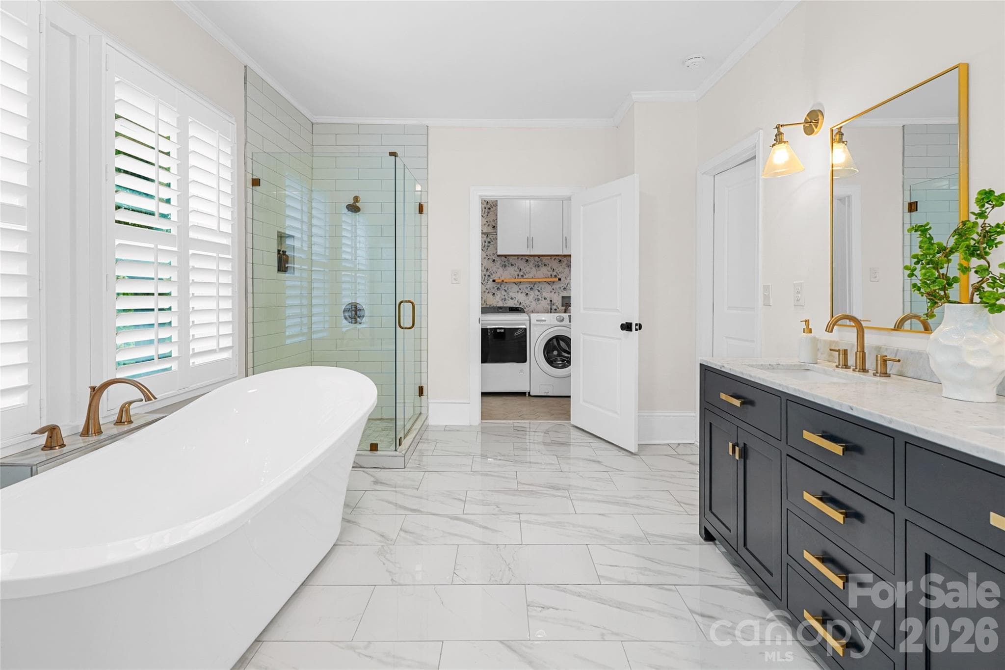 Walk-in shower completes the beautifully updated primary bath. - Charlotte