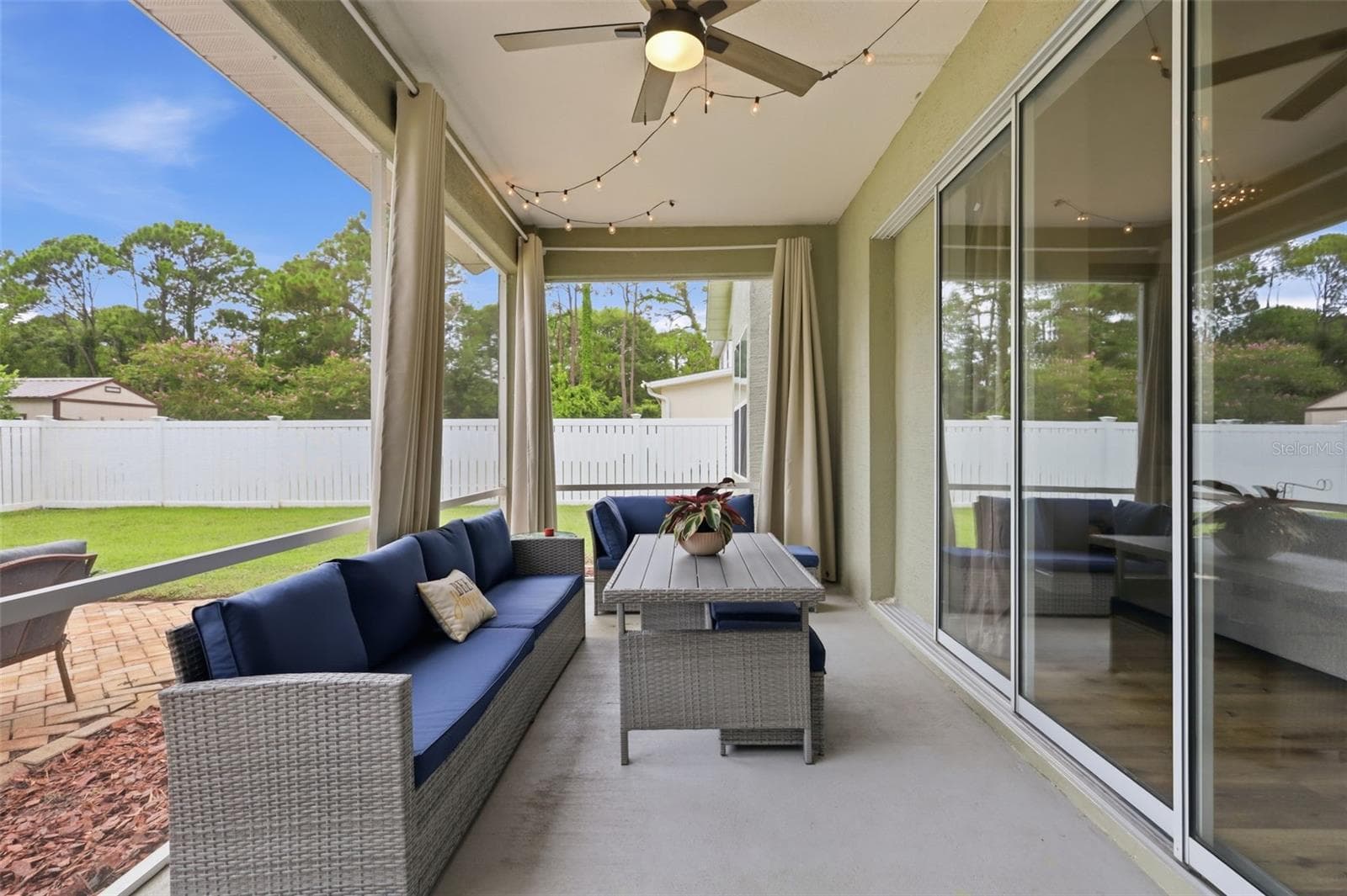 Large screened in the huge, vinyl fenced backyard. - 96 PARKVIEW DR, PALM COAST