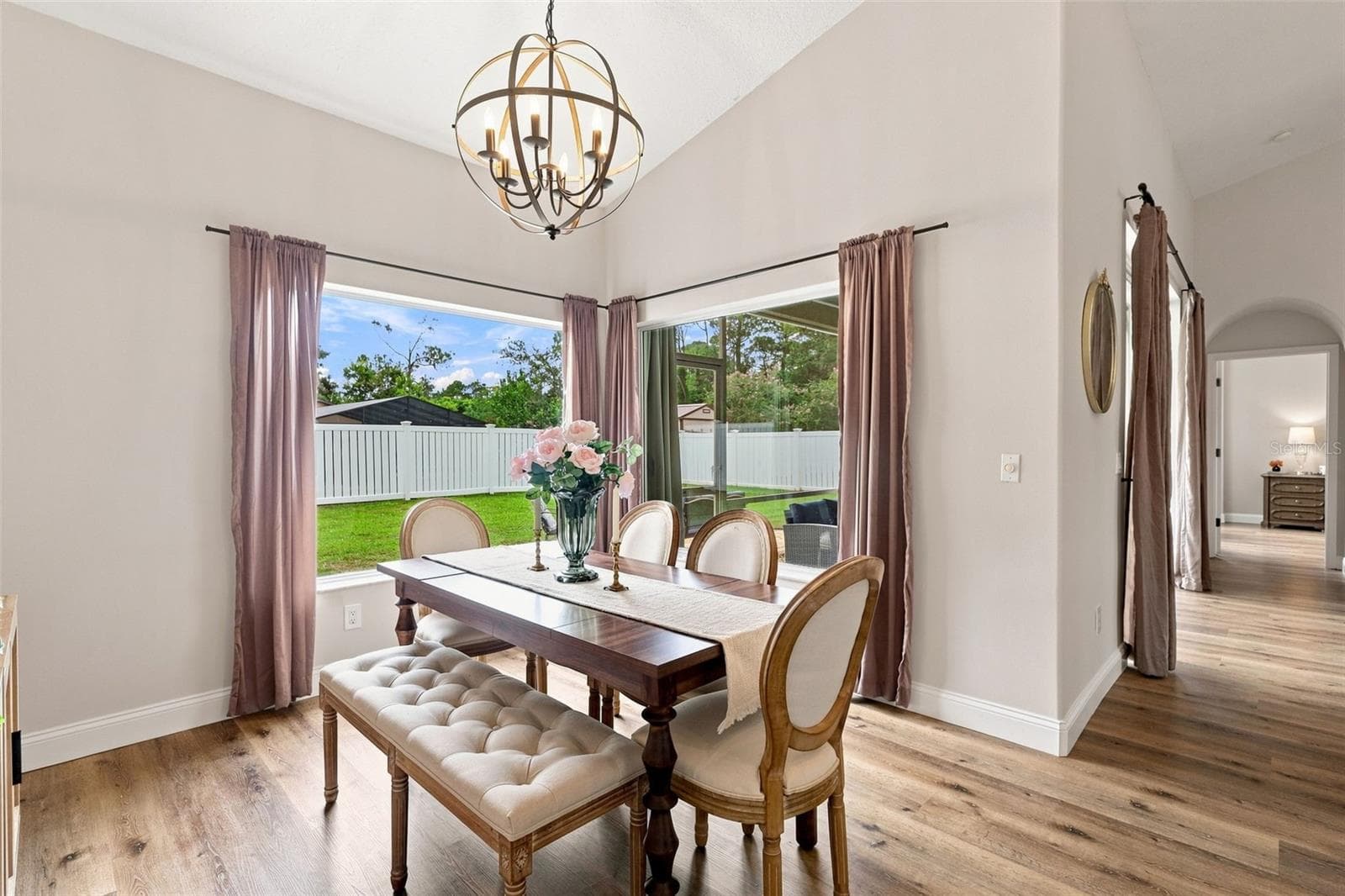 Dining area looking out to screened porch. - 96 PARKVIEW DR, PALM COAST