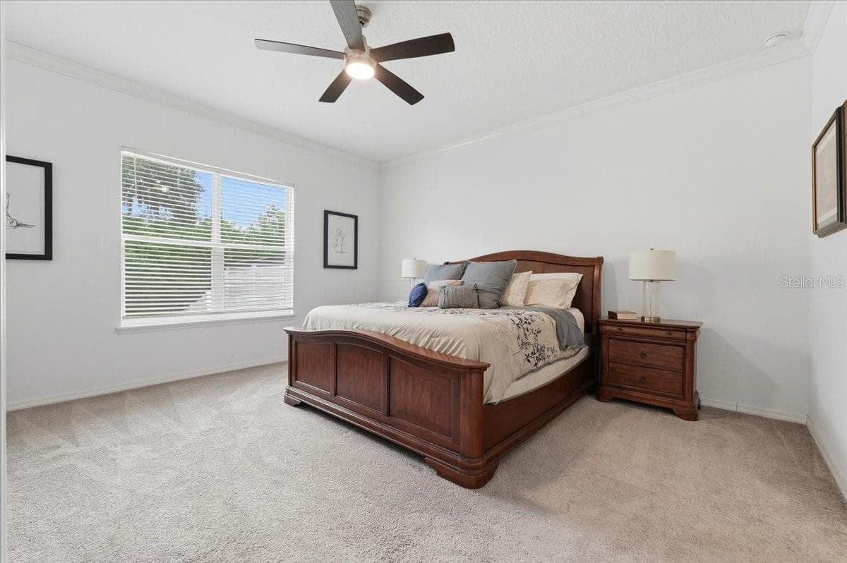 Serene and generously proportioned, the primary suite offers a peaceful retreat with room to unwind after a long day. - 4791 RIVERWALK DR, ST CLOUD