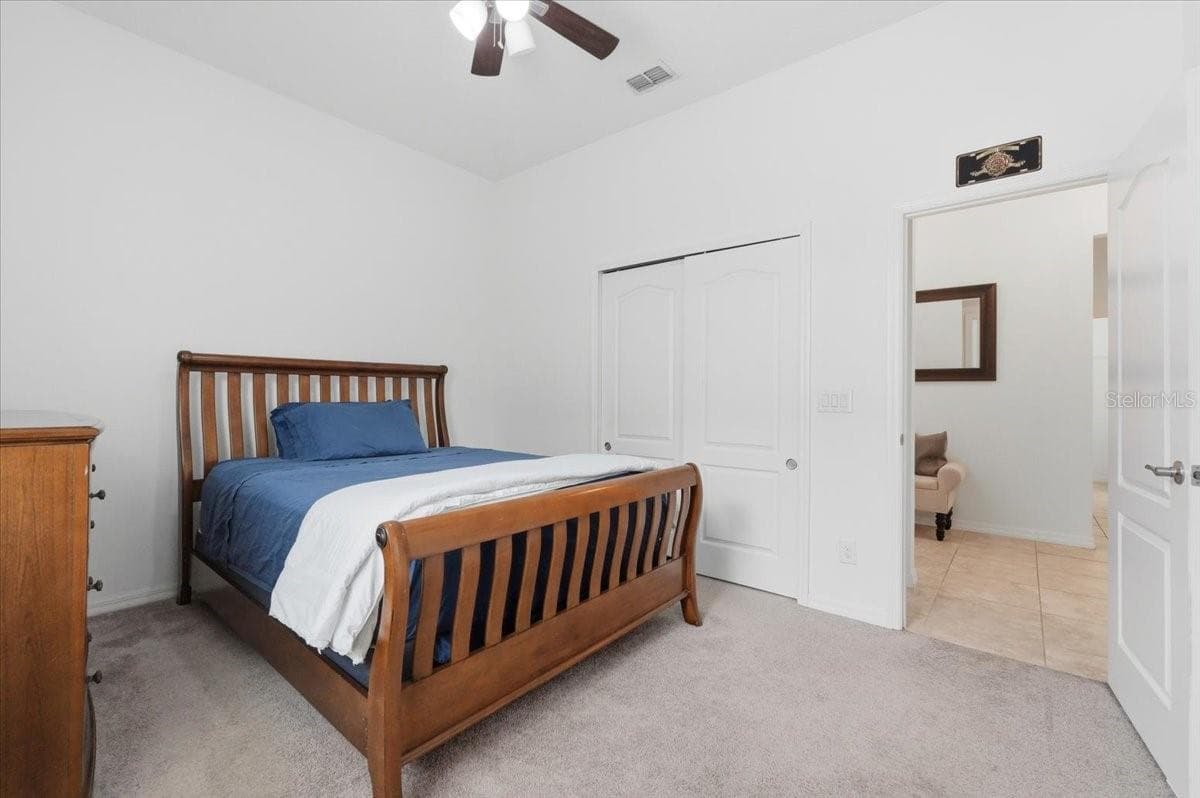 Bright and comfortable, Bedroom 2 offers generous proportions, natural light and makes you feel instantly at home. - 4791 RIVERWALK DR, ST CLOUD