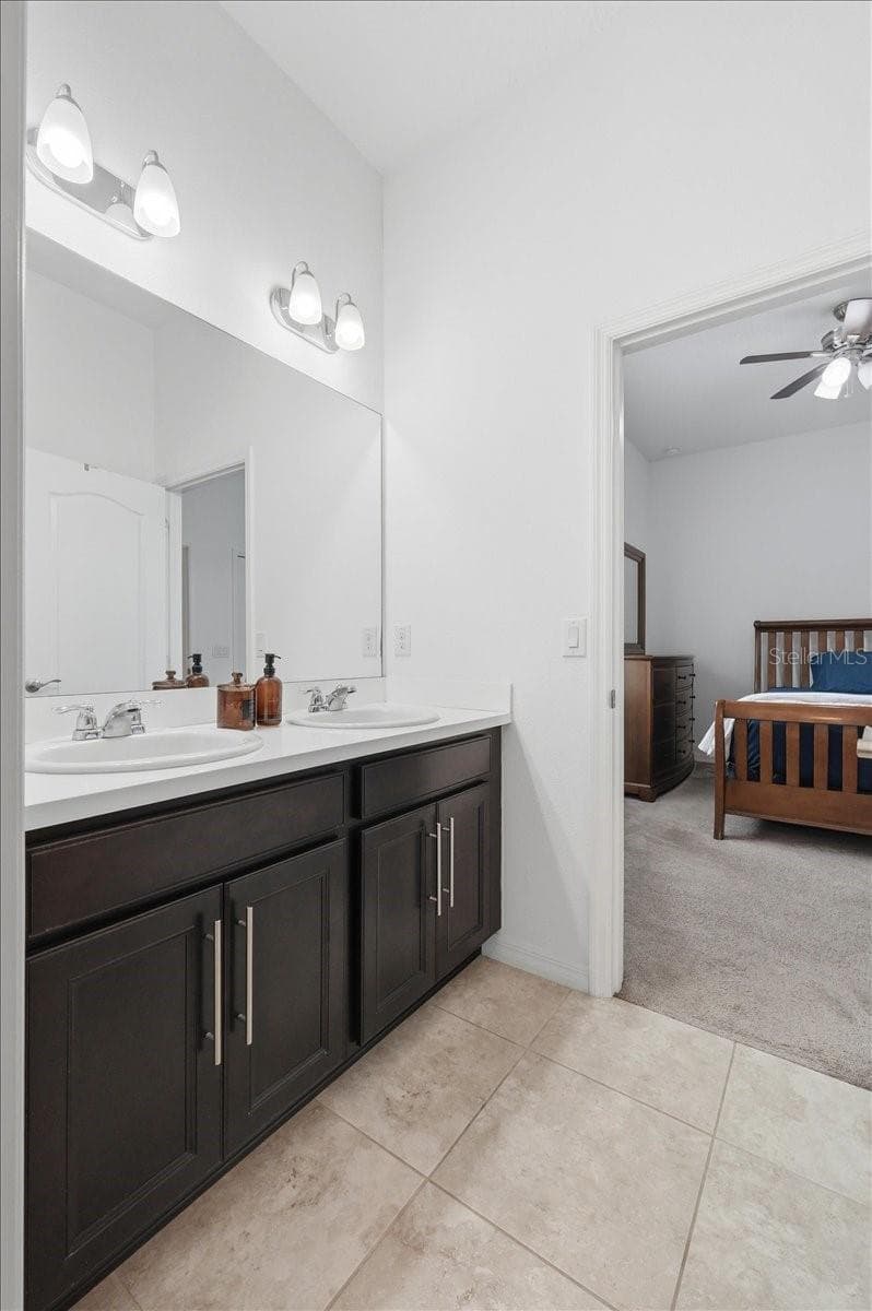 Bedrooms 2 and 3 are thoughtfully connected by a Jack-and-Jill bath adding privacy, convenience and every day functionality. - 4791 RIVERWALK DR, ST CLOUD